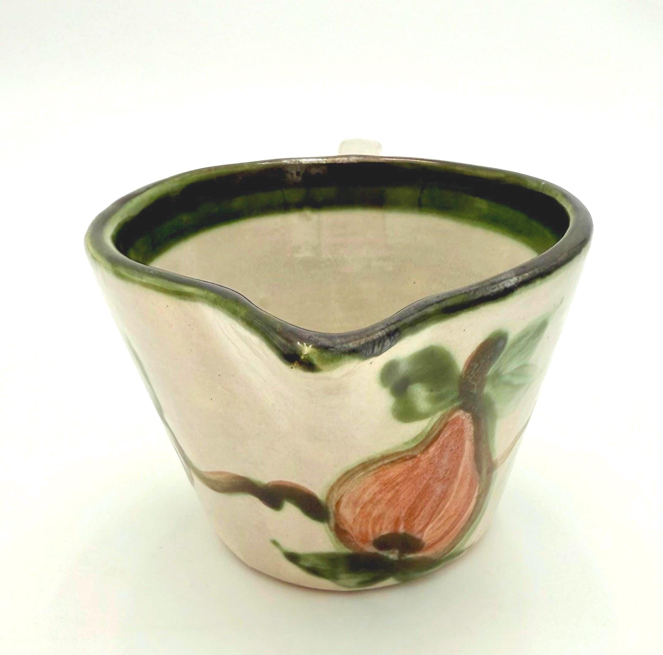 Vintage 1950s John B. Taylor Harvest pattern ceramic creamer with raised fruit and leaf motif.