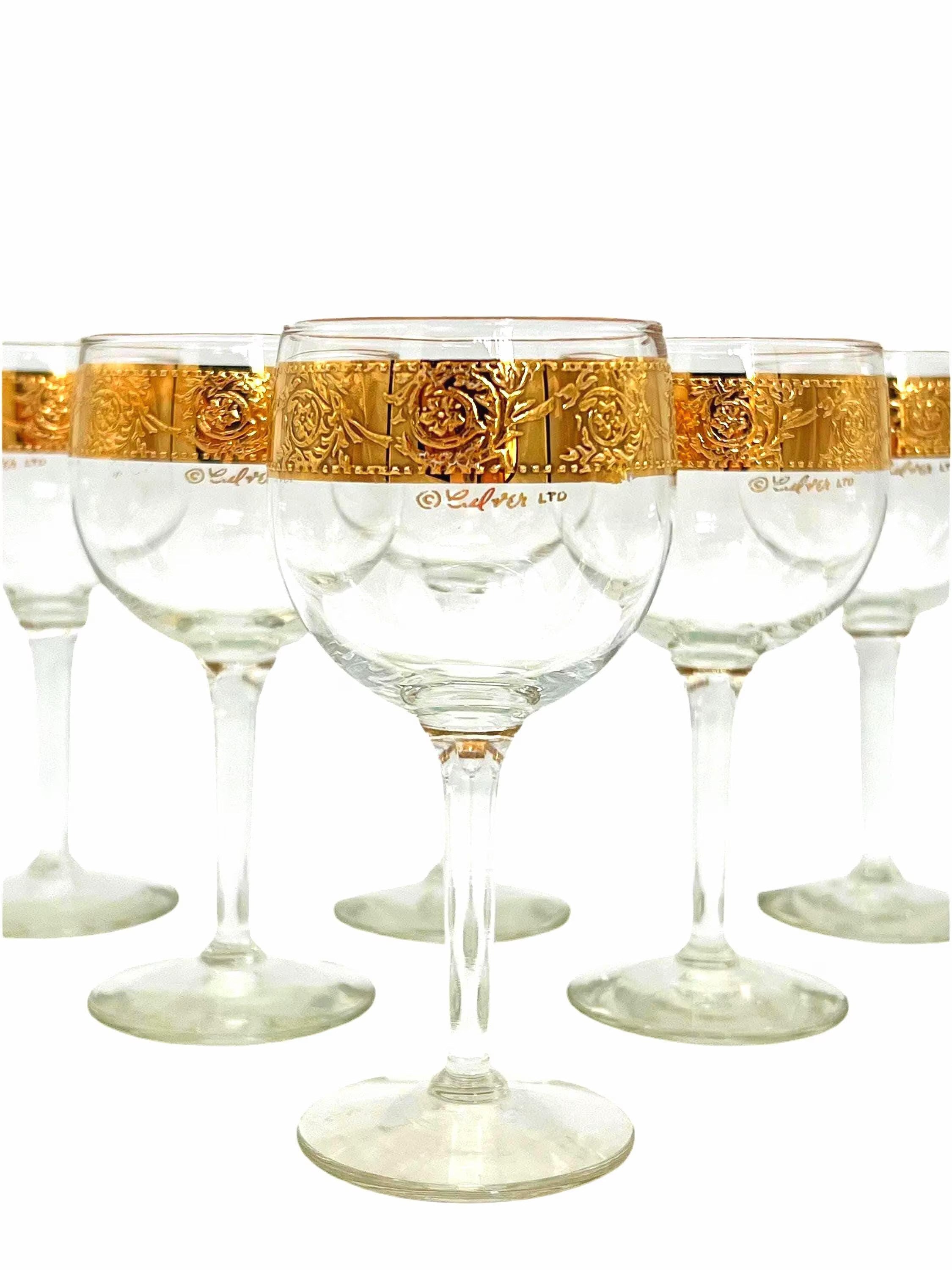 Set of 6 vintage Culver Tyrol wine glasses featuring 22k gold encrusted textured bands on clear glass stems.