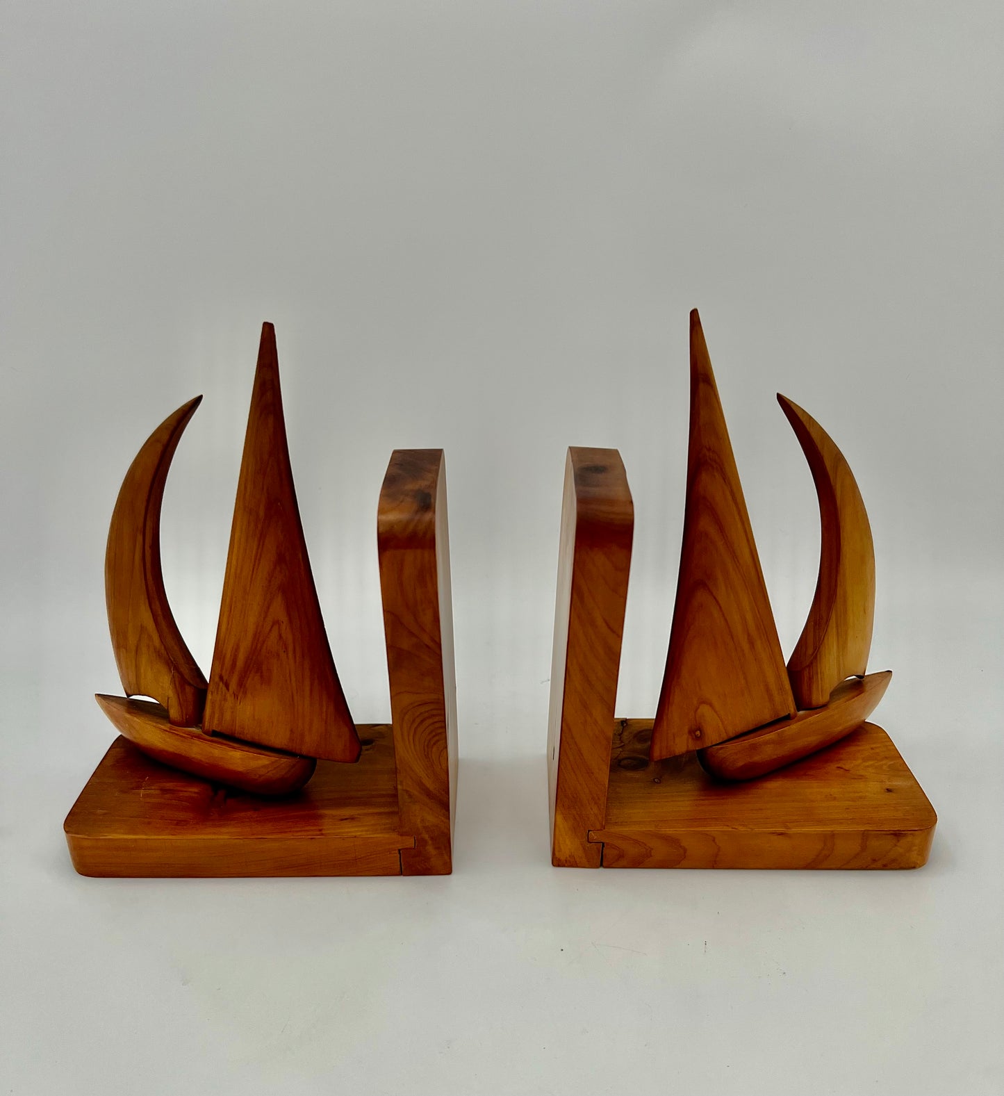 PAIR OF TEAK MIDCENTURY SWIVELING SAILBOAT BOOK ENDS, CIRCA 1965