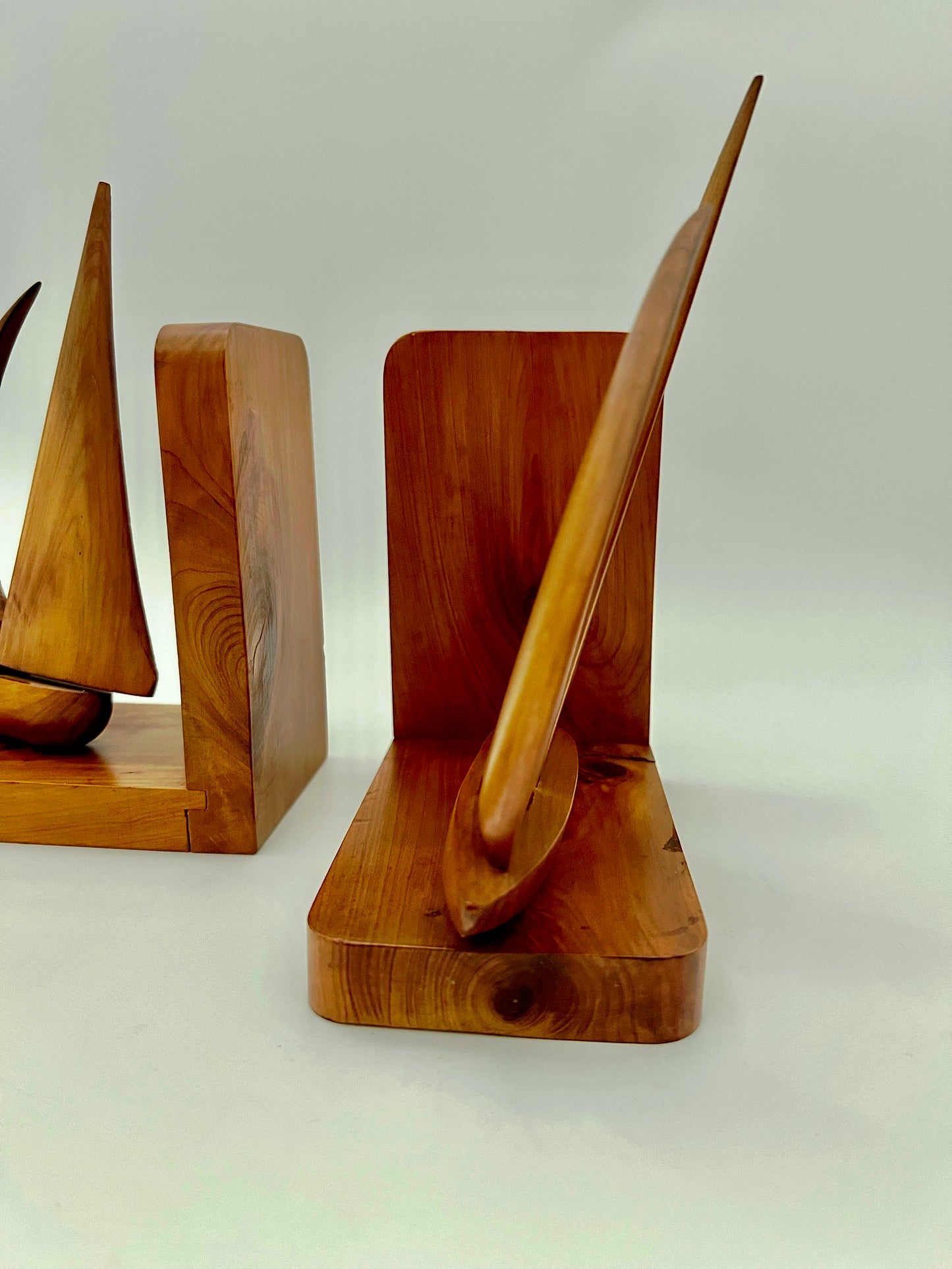 PAIR OF TEAK MIDCENTURY SWIVELING SAILBOAT BOOK ENDS, CIRCA 1965