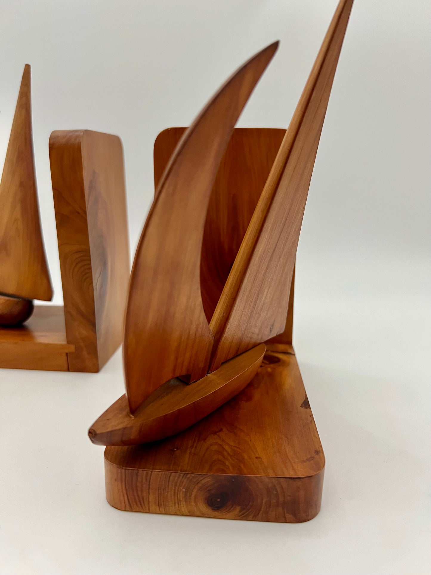 PAIR OF TEAK MIDCENTURY SWIVELING SAILBOAT BOOK ENDS, CIRCA 1965