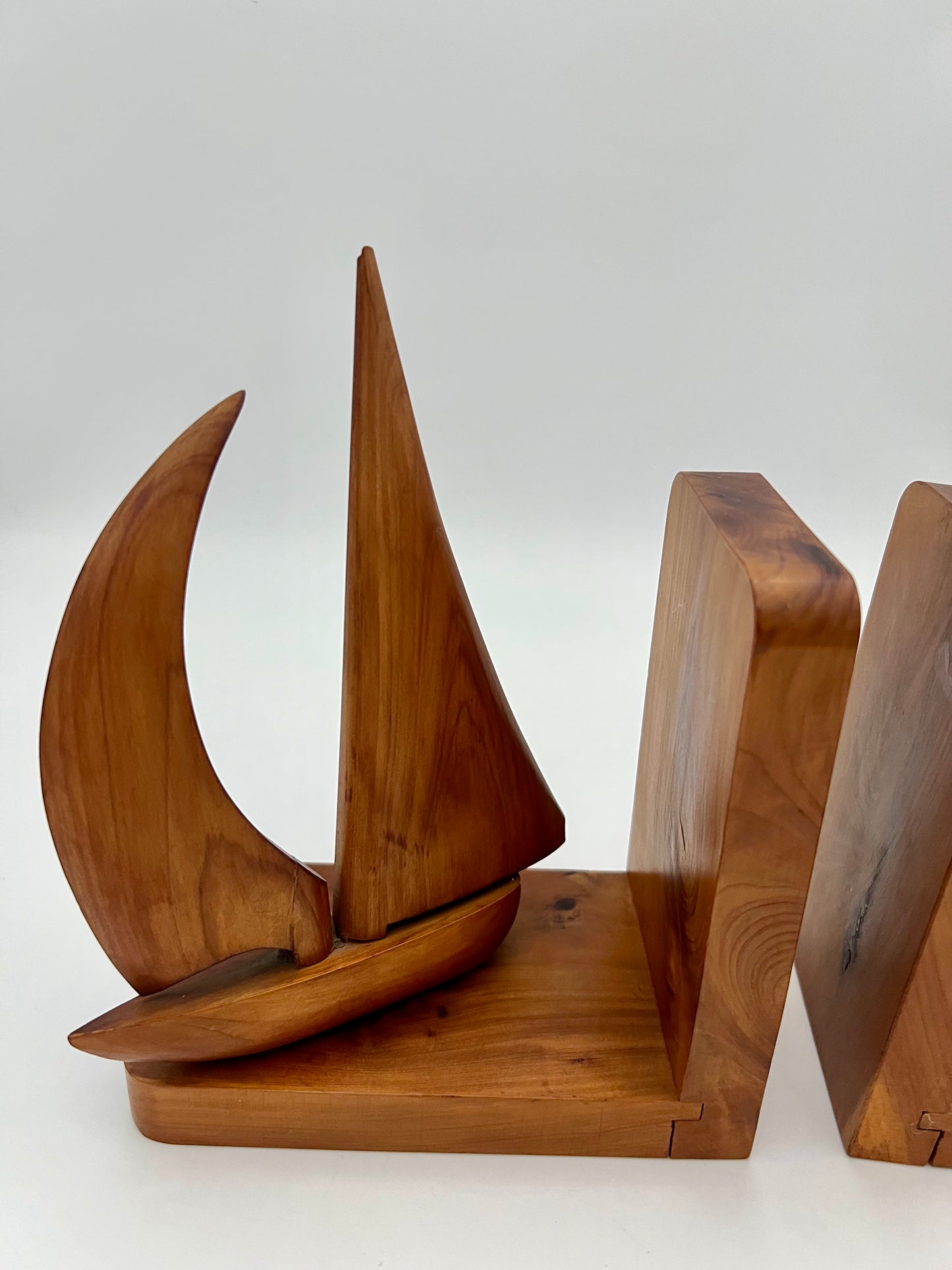 PAIR OF TEAK MIDCENTURY SWIVELING SAILBOAT BOOK ENDS, CIRCA 1965
