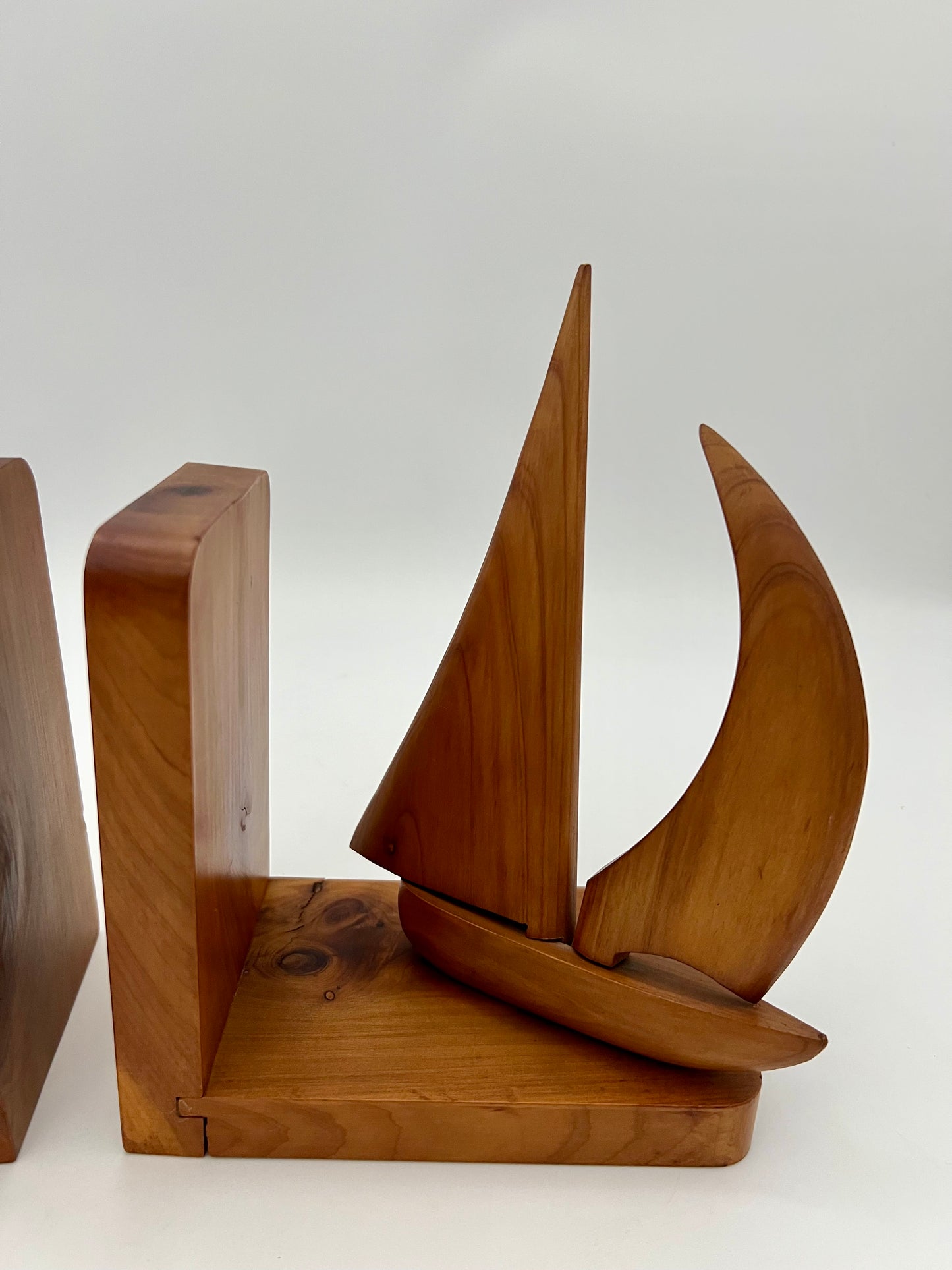 PAIR OF TEAK MIDCENTURY SWIVELING SAILBOAT BOOK ENDS, CIRCA 1965