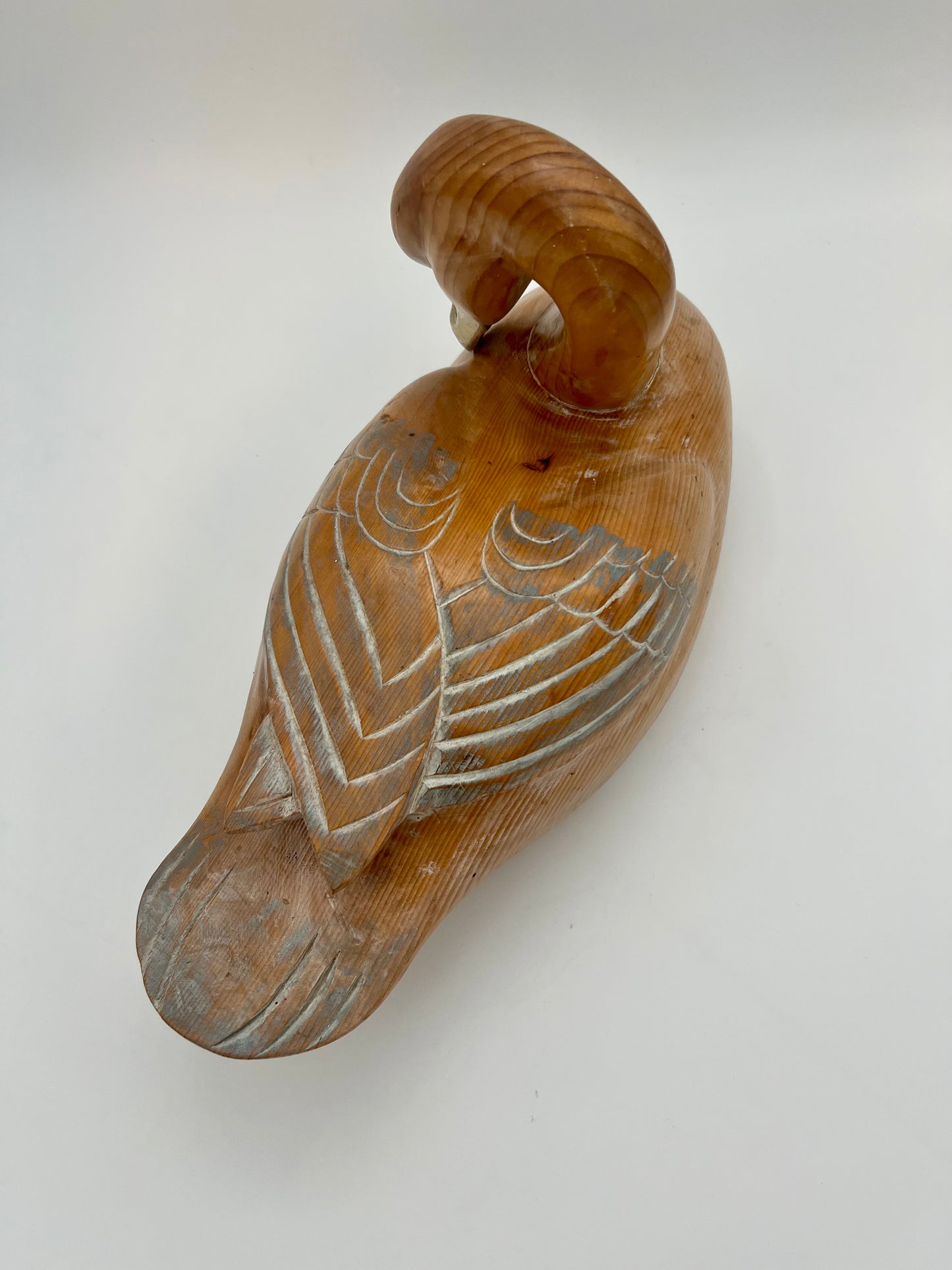 WOOD CARVED SLEEPING DUCK HAND PAINTED WITH BRASS DETAIL