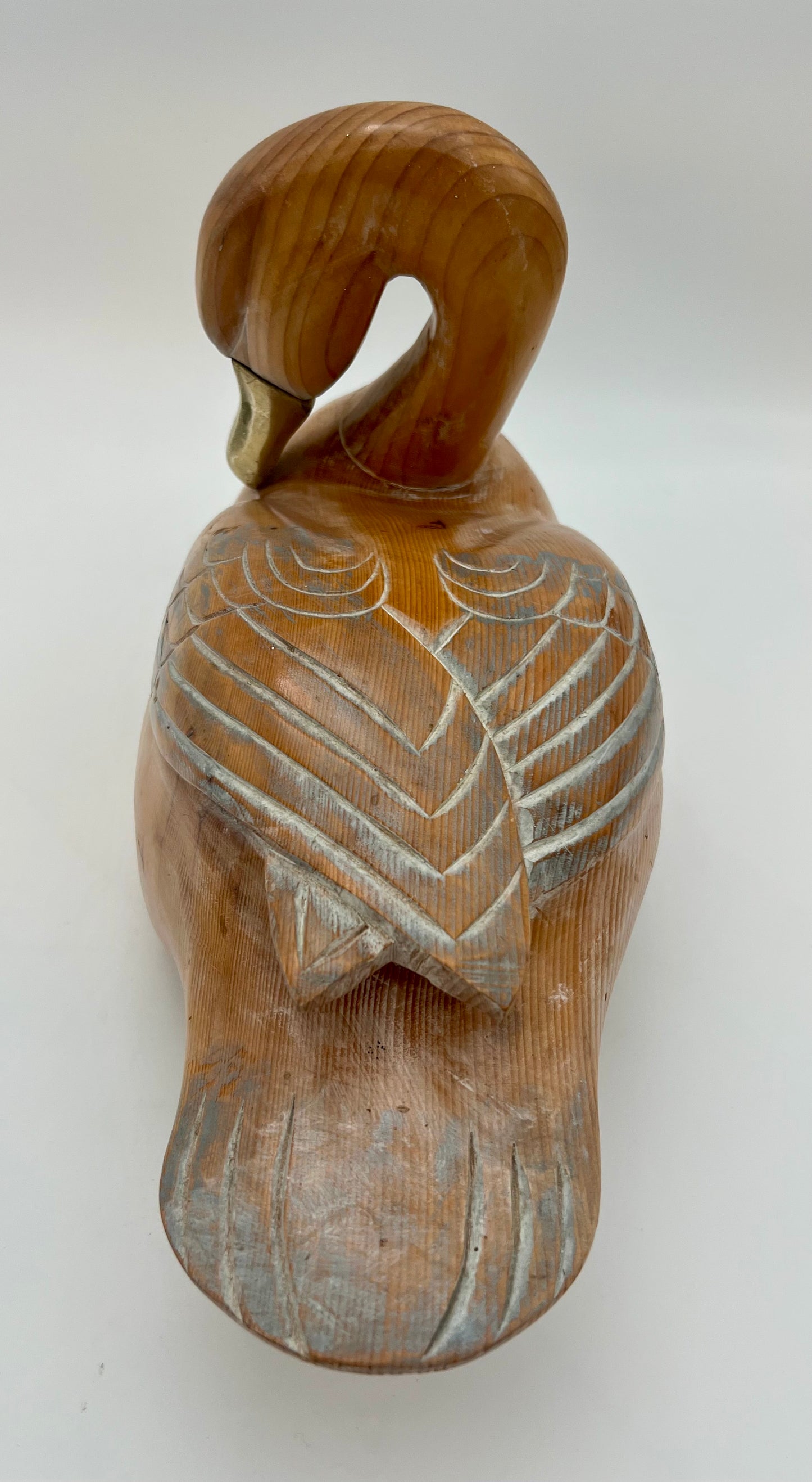 WOOD CARVED SLEEPING DUCK HAND PAINTED WITH BRASS DETAIL