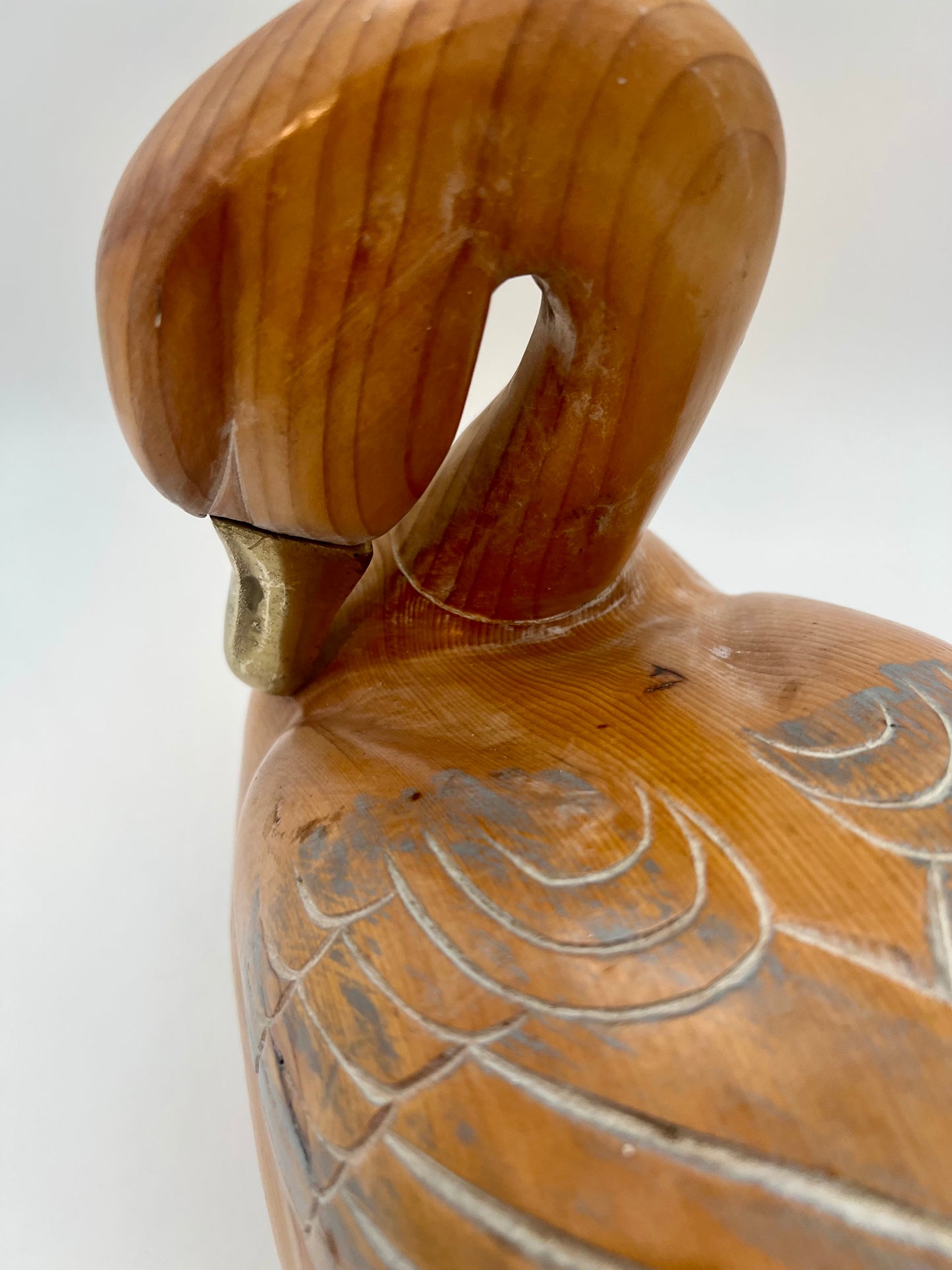 WOOD CARVED SLEEPING DUCK HAND PAINTED WITH BRASS DETAIL