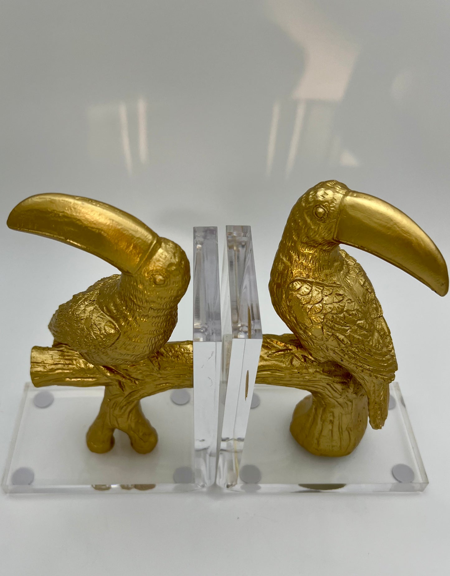 VINTAGE 1980S LUCITE GOLD TOUCAN BOOKENDS