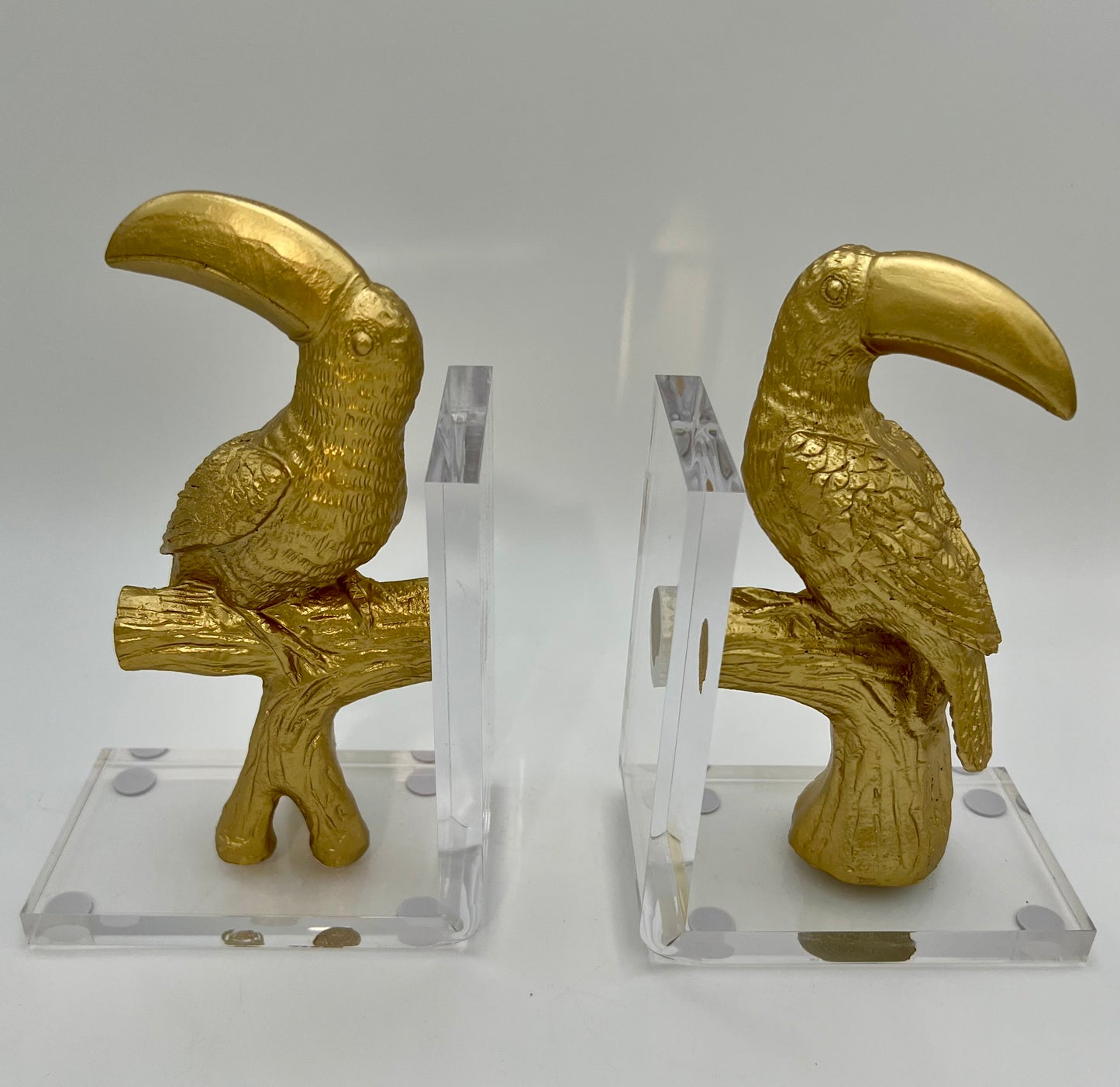VINTAGE 1980S LUCITE GOLD TOUCAN BOOKENDS