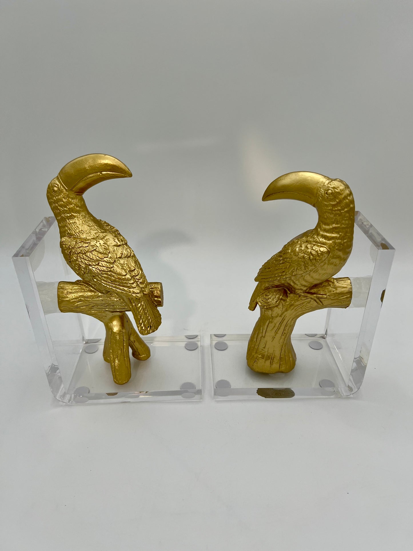VINTAGE 1980S LUCITE GOLD TOUCAN BOOKENDS