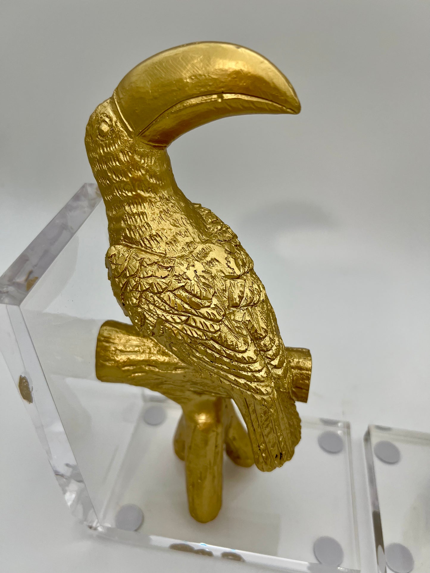 VINTAGE 1980S LUCITE GOLD TOUCAN BOOKENDS