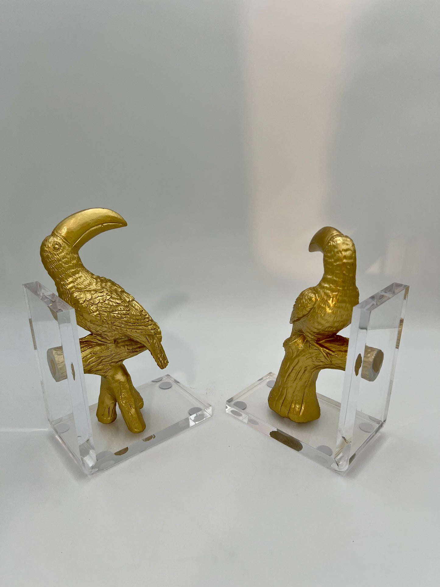 VINTAGE 1980S LUCITE GOLD TOUCAN BOOKENDS