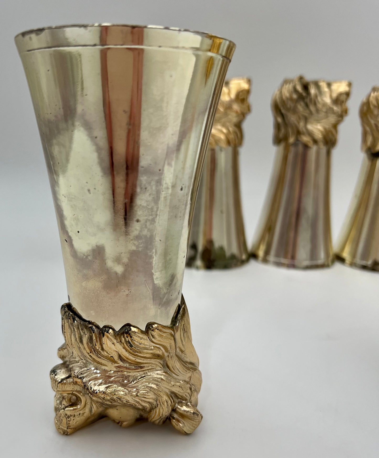 CAROLE STUPELL MID-CENTURY LION HEAD PITCHER AND STIRRUP CUPS, RARE SET OF 7