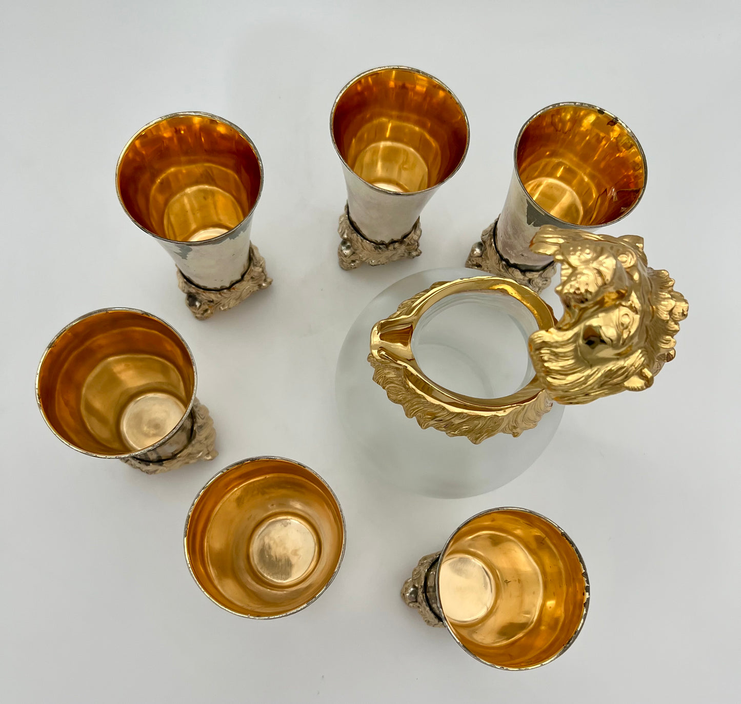 CAROLE STUPELL MID-CENTURY LION HEAD PITCHER AND STIRRUP CUPS, RARE SET OF 7