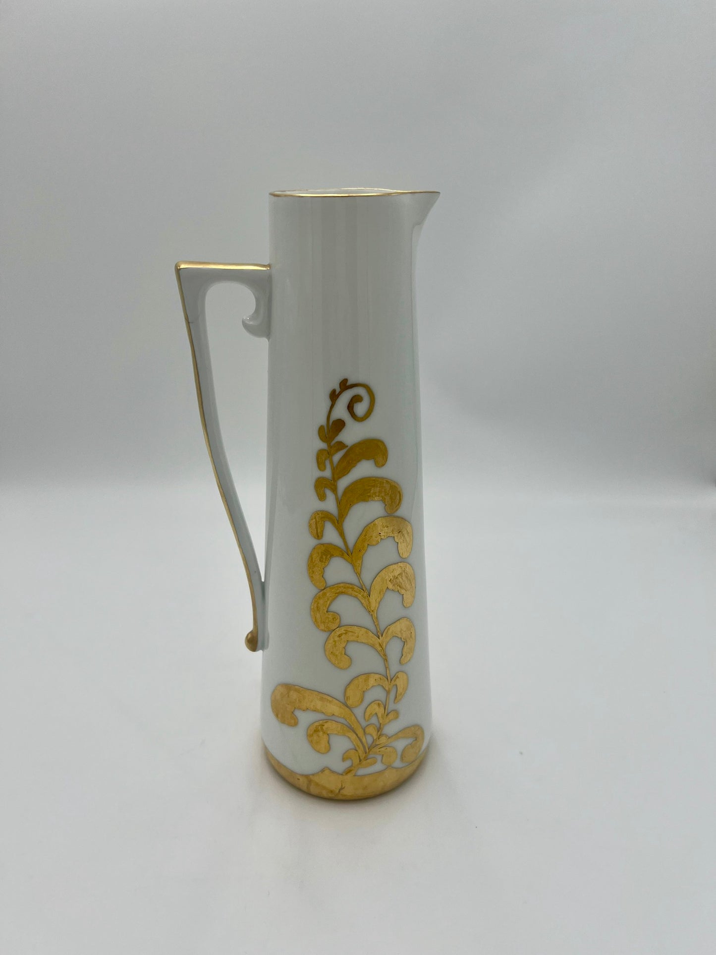 VINTAGE GERMAN WHITE AND GOLD PORCELAIN HAND PAINTED PITCHER/VASE