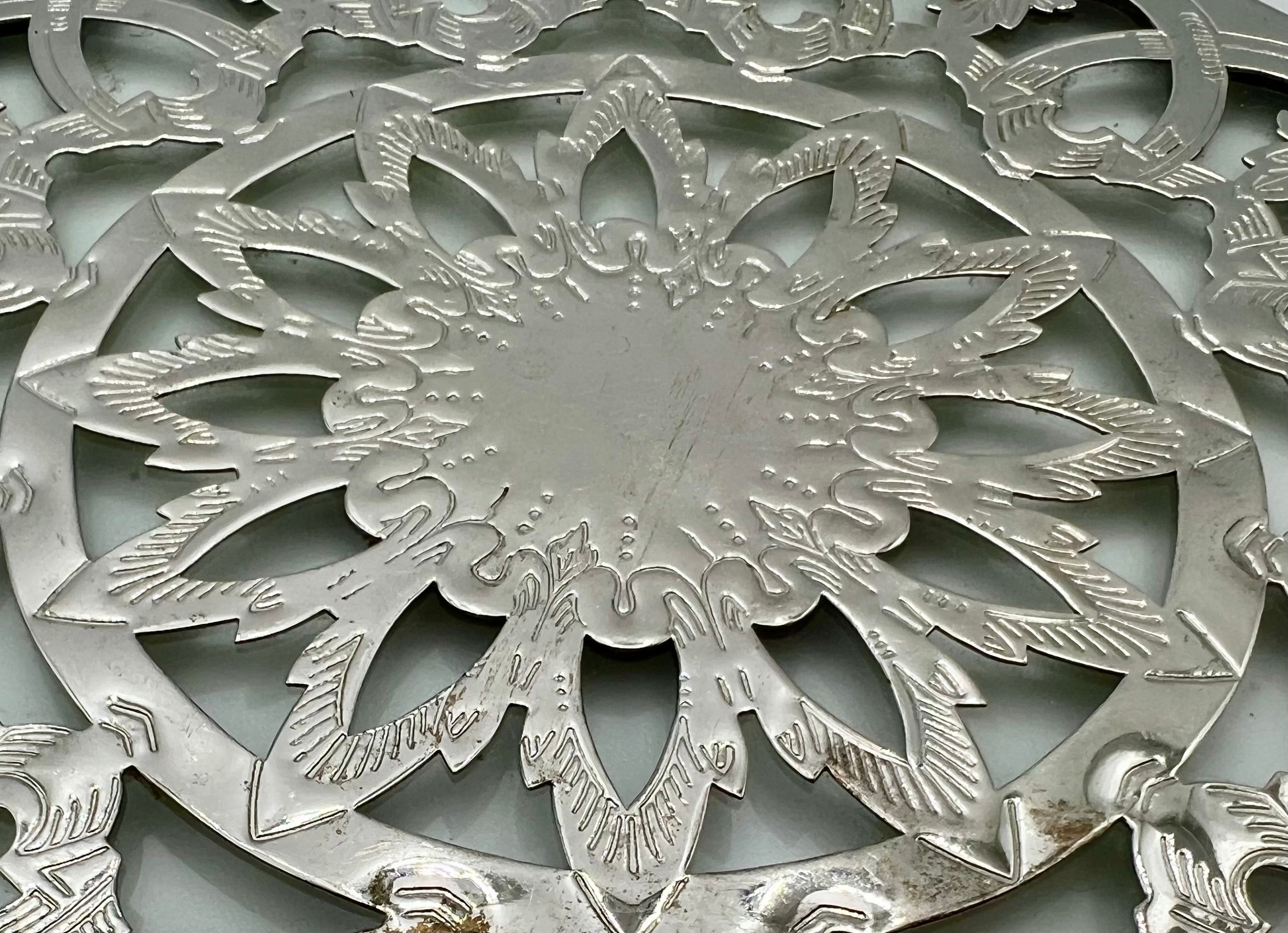VINTAGE GLASS-BACKED SILVER-PLATE TRIVET — PIERCED FLORAL DESIGN, LIKELY SPANISH, MID-CENTURY