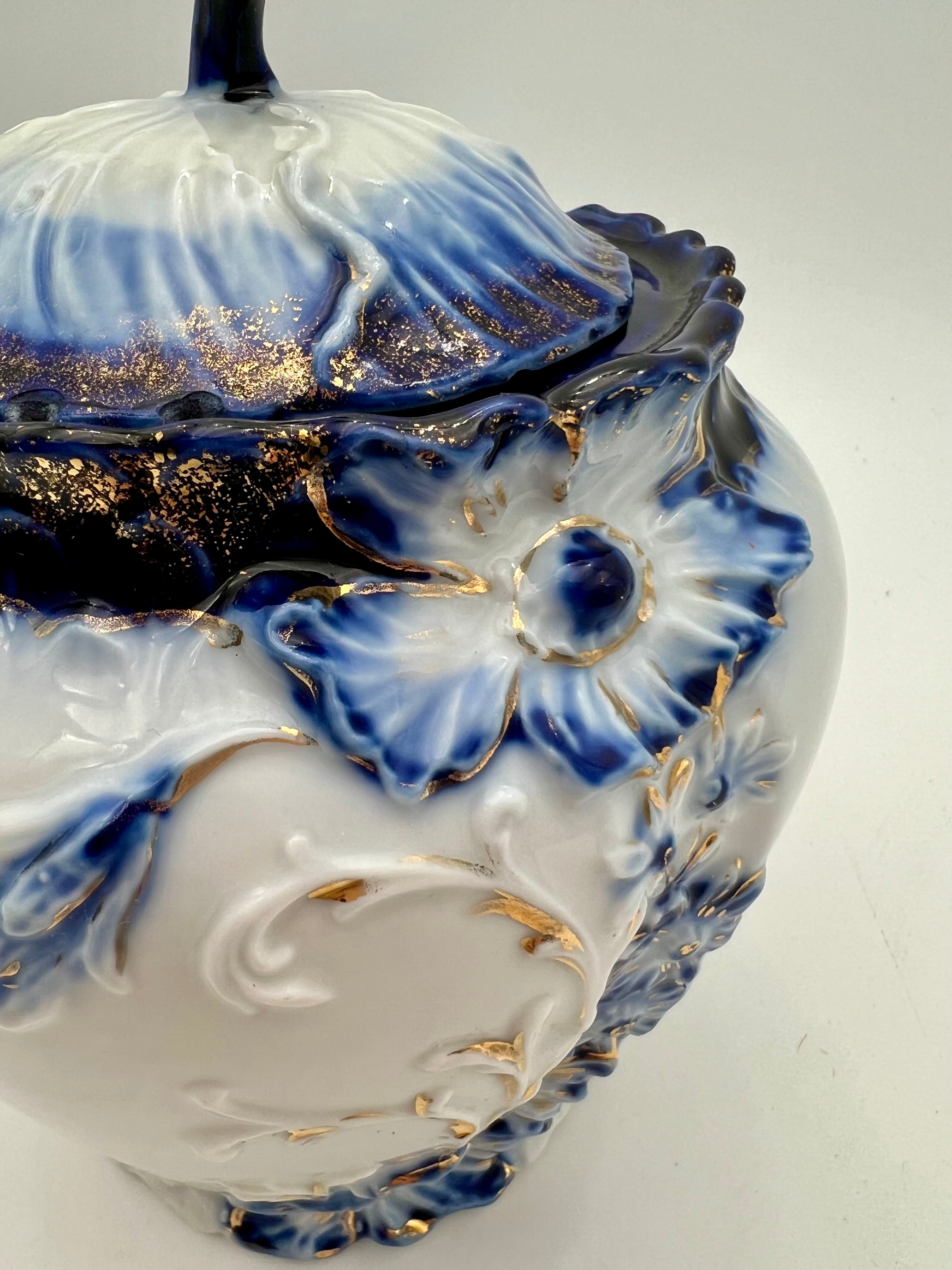 ANTIQUE COBALT BLUE & GOLD GILT PORCELAIN BISCUIT JAR WITH FLORAL RELIEF