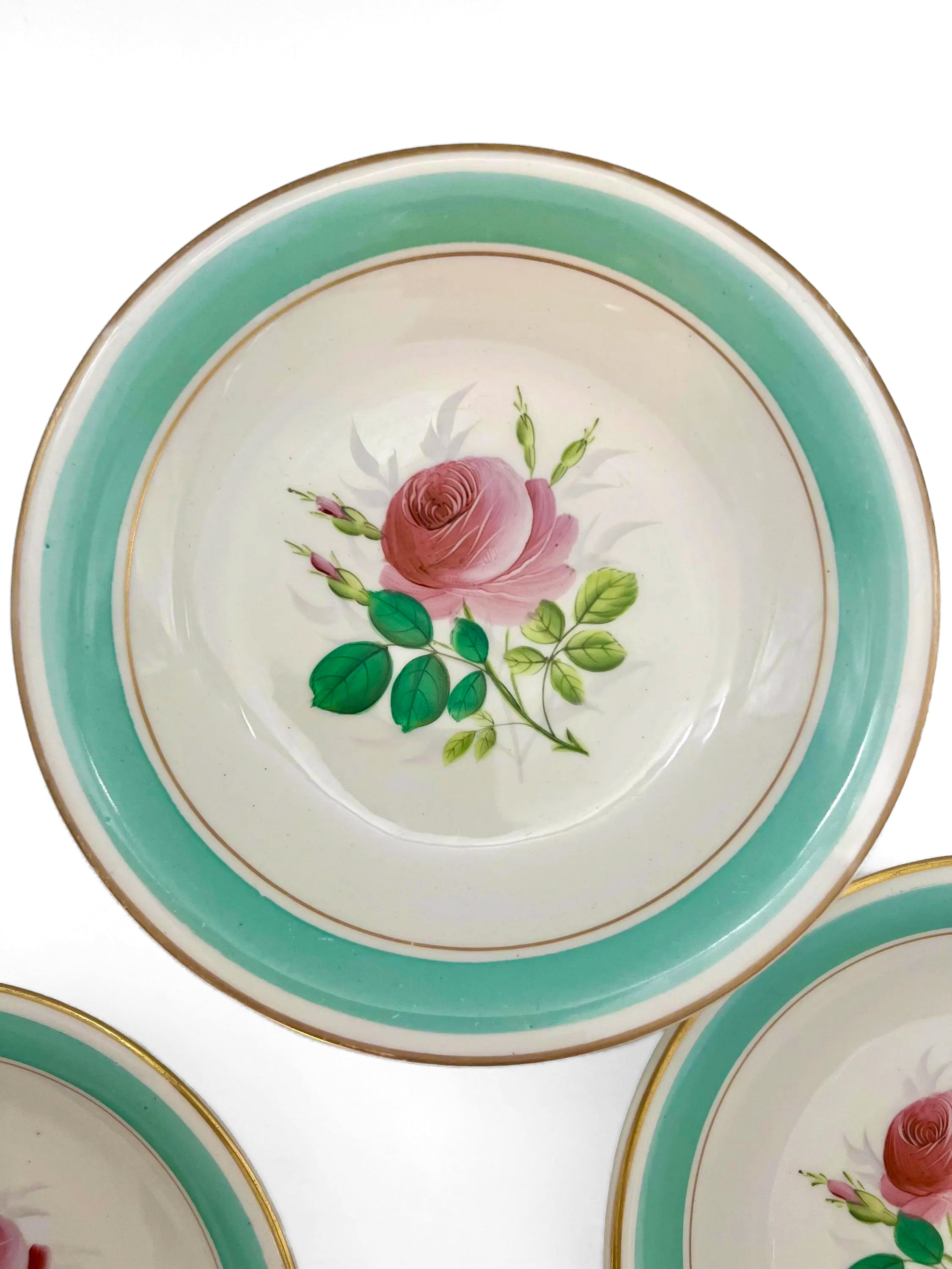 Trio of 1880s English Victorian ceramic compotes featuring hand-painted floral bouquets and pedestal bases.