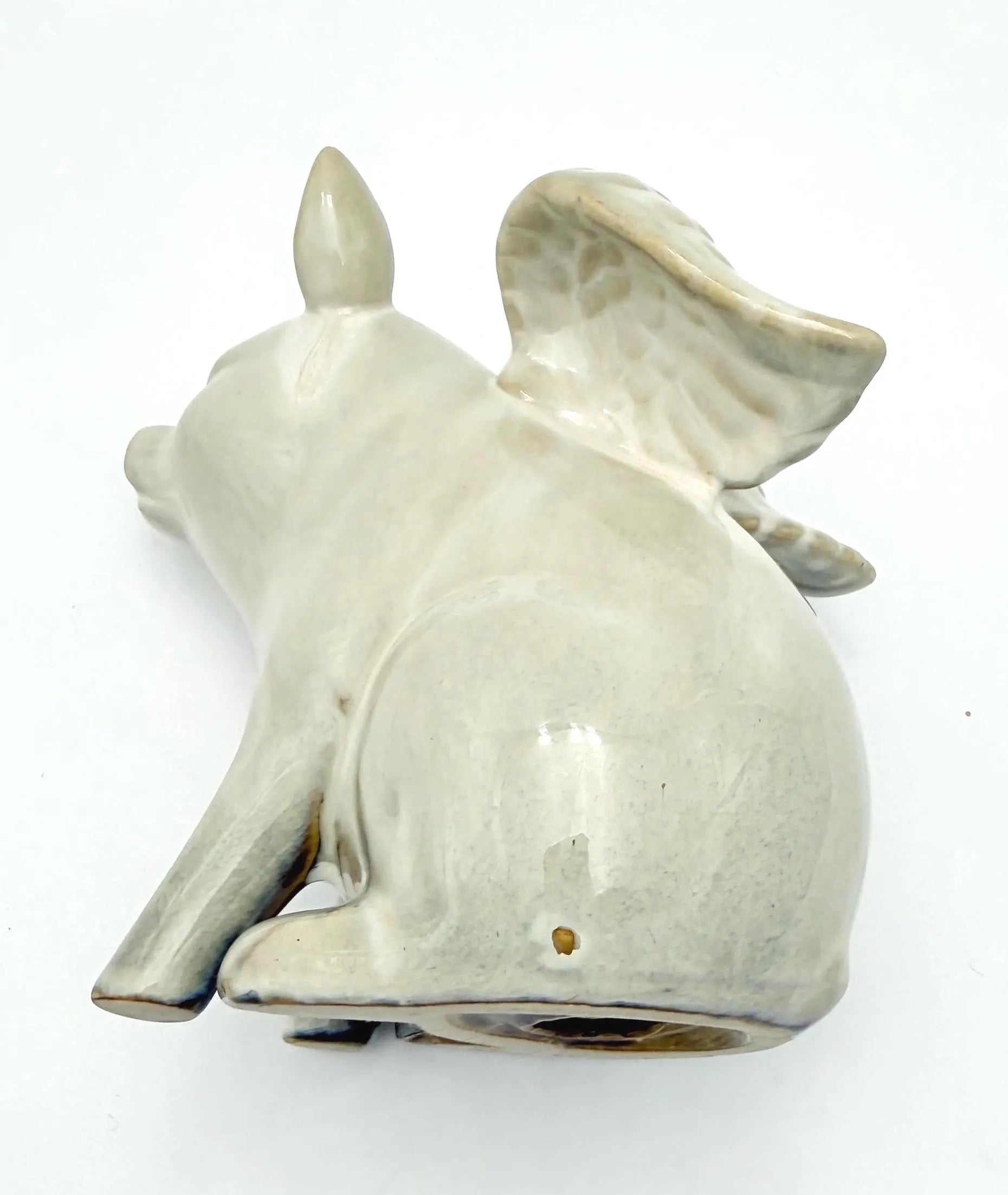 VINTAGE IVORY CERAMIC FLYING PIG FIGURINE