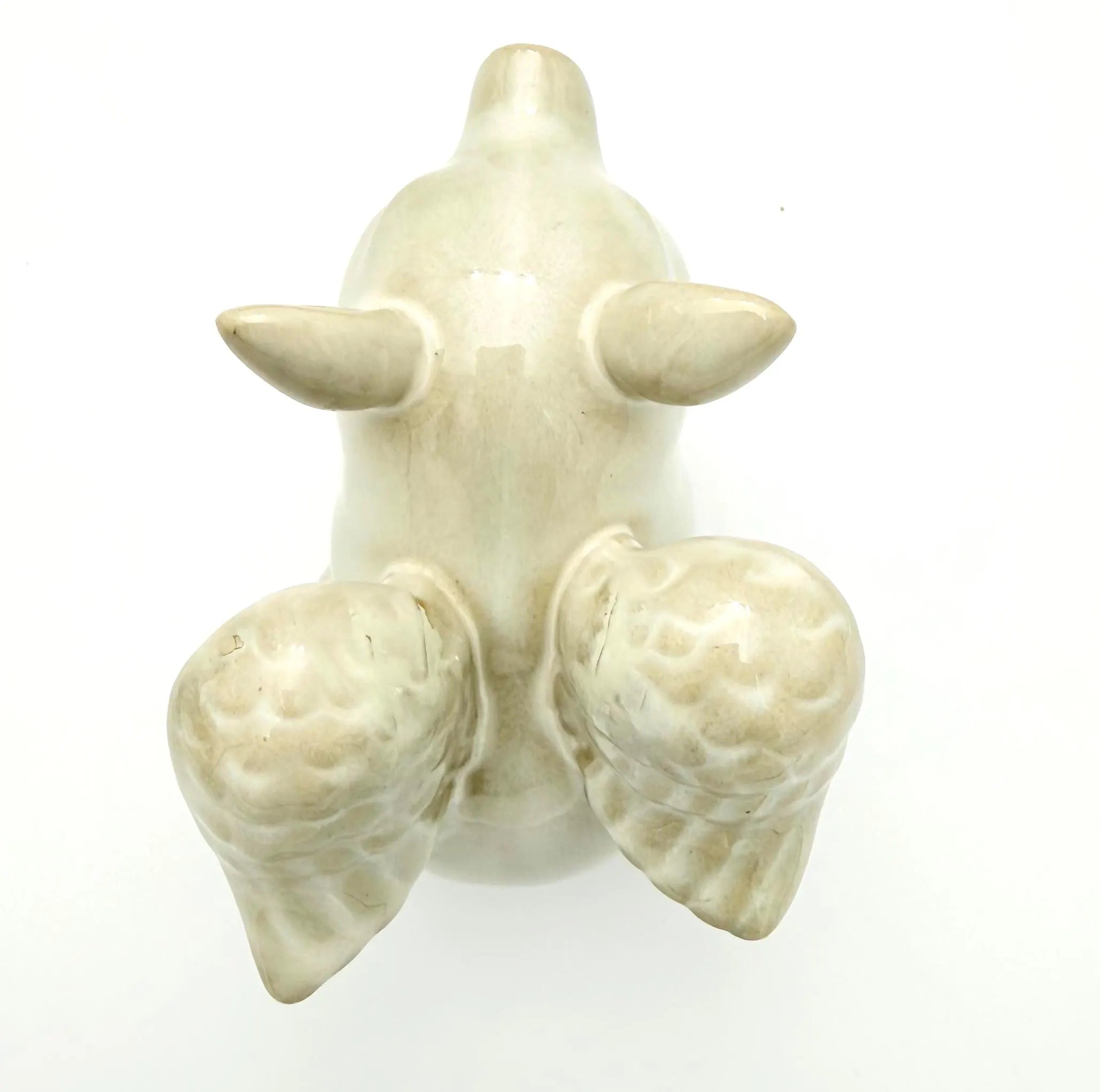 VINTAGE IVORY CERAMIC FLYING PIG FIGURINE