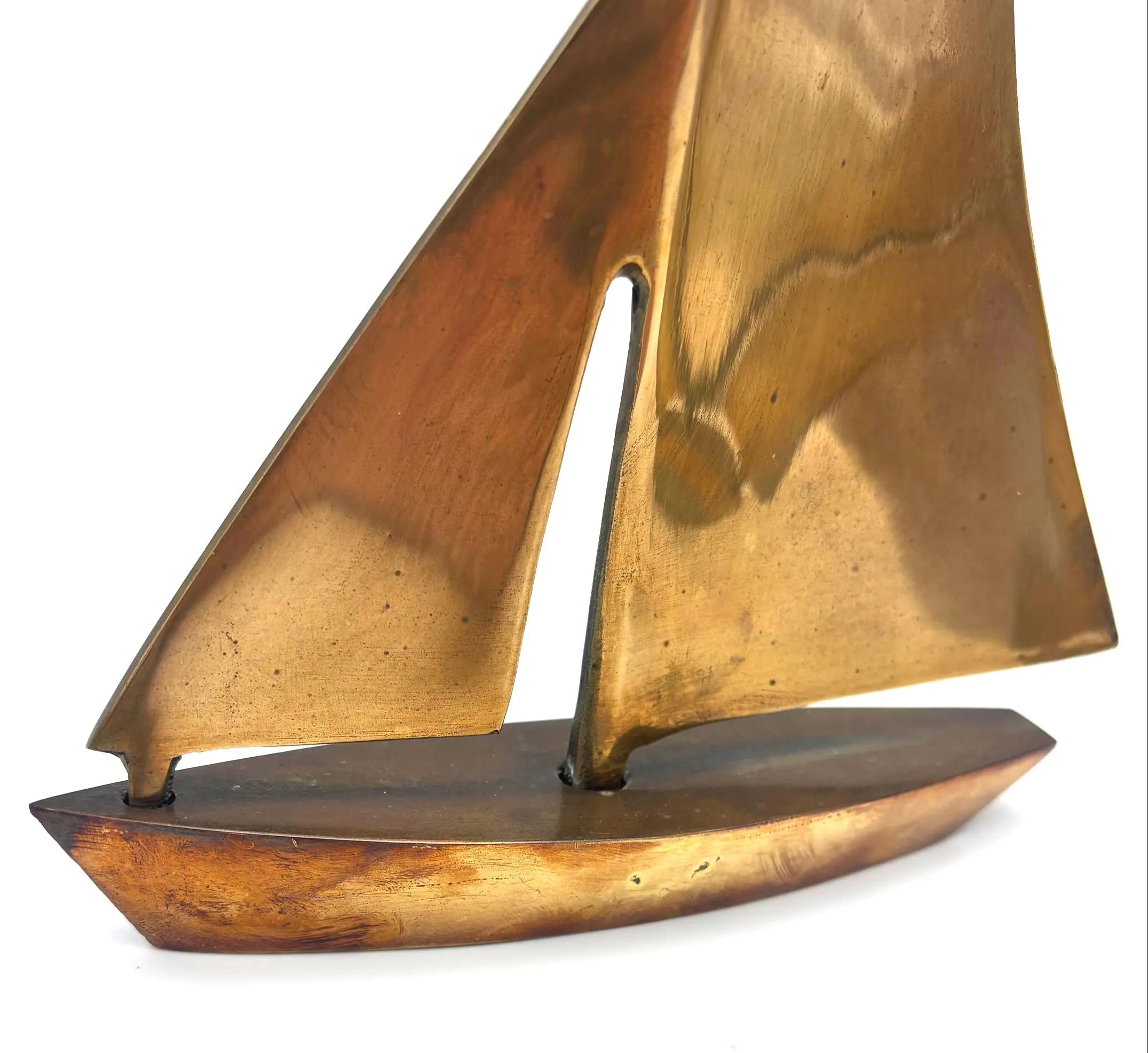 VINTAGE SOLID BRASS SAILBOAT SCULPTURES – COLLECTION OF FOUR MODERNIST YACHTS