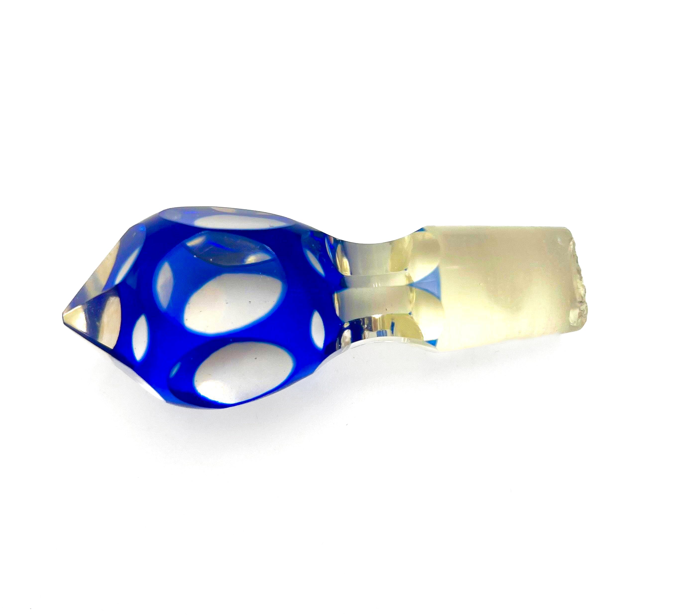 Minimalist mid-century modern decanter in a deep cobalt blue glass with a matching round stopper.