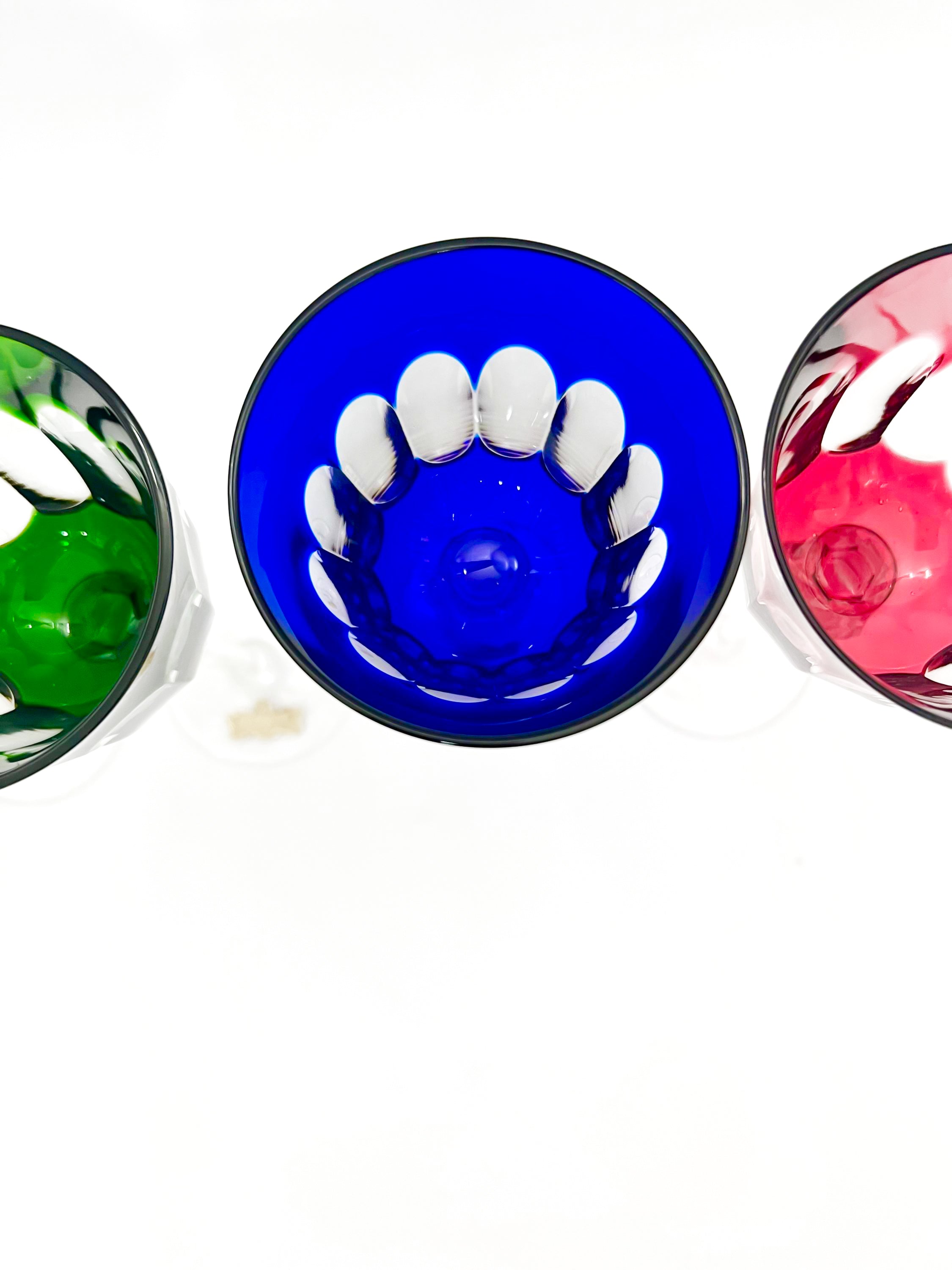 Set of 4 Nachtmann Romer wine glasses in mint condition with colorful cut-to-clear bowls and faceted stems.
