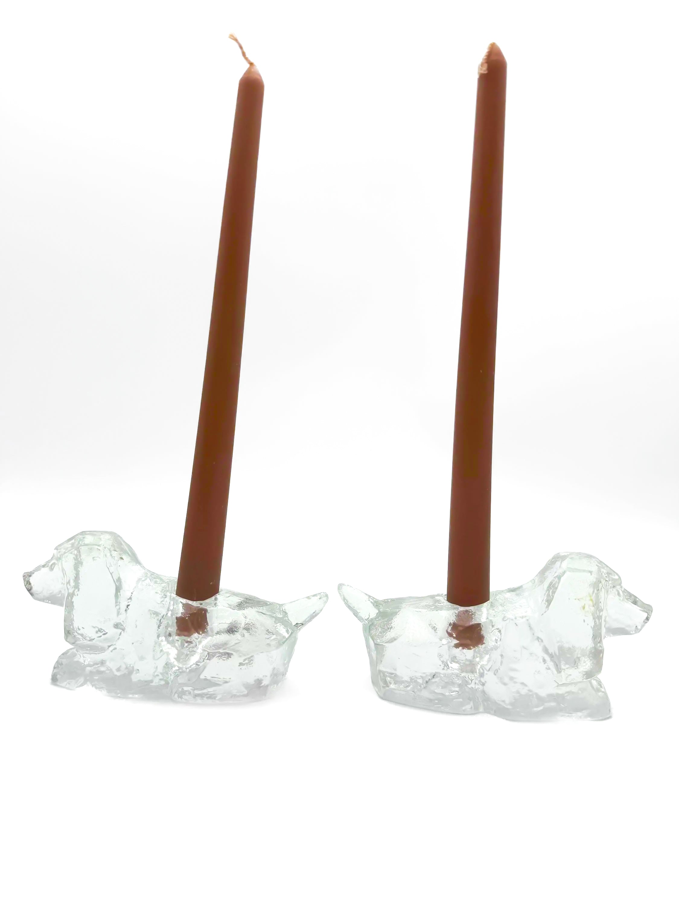Pair of vintage heavy lead crystal candlestick holders shaped like sitting puppies.