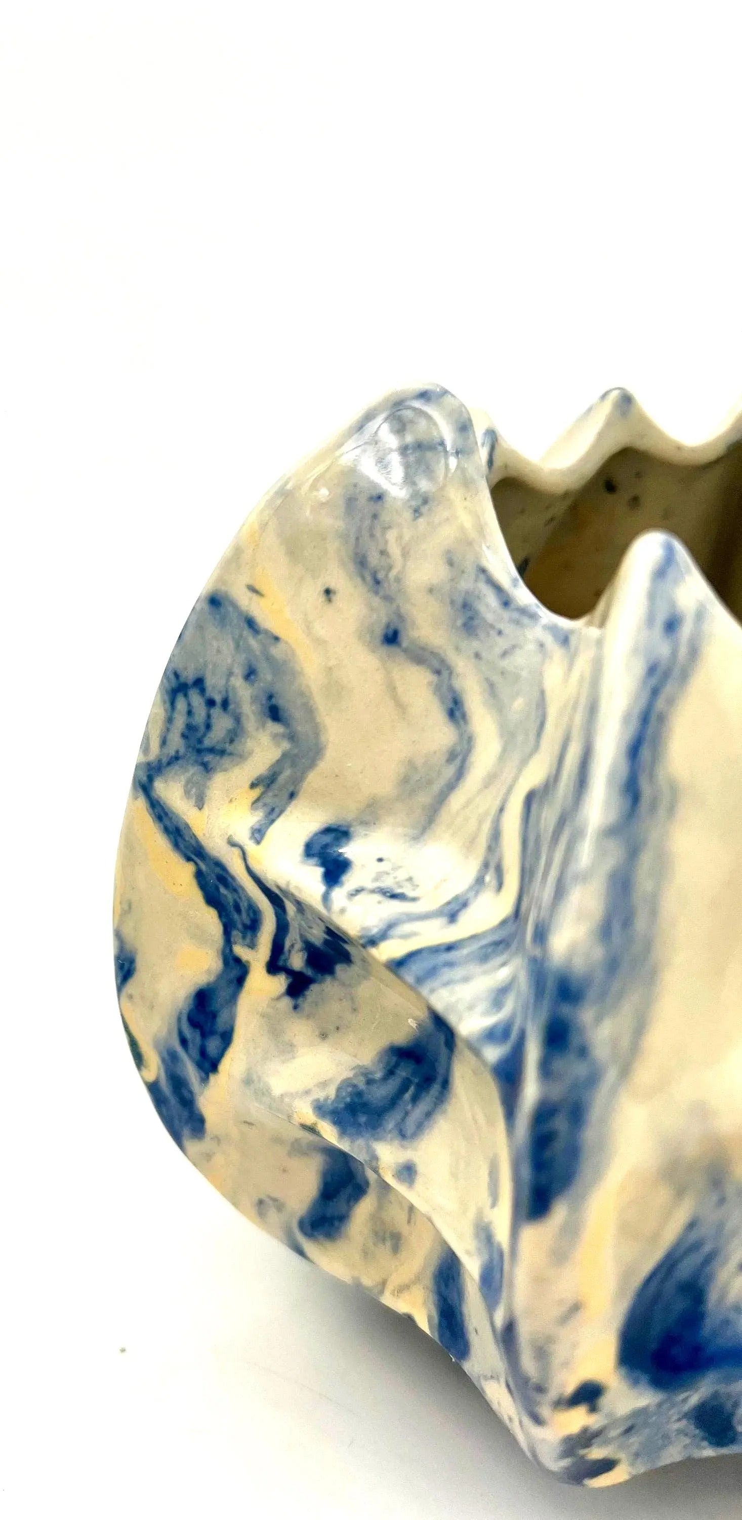 Pair of vintage ceramic planters or candle holders with an abstract blue and white splatter-ware pattern.