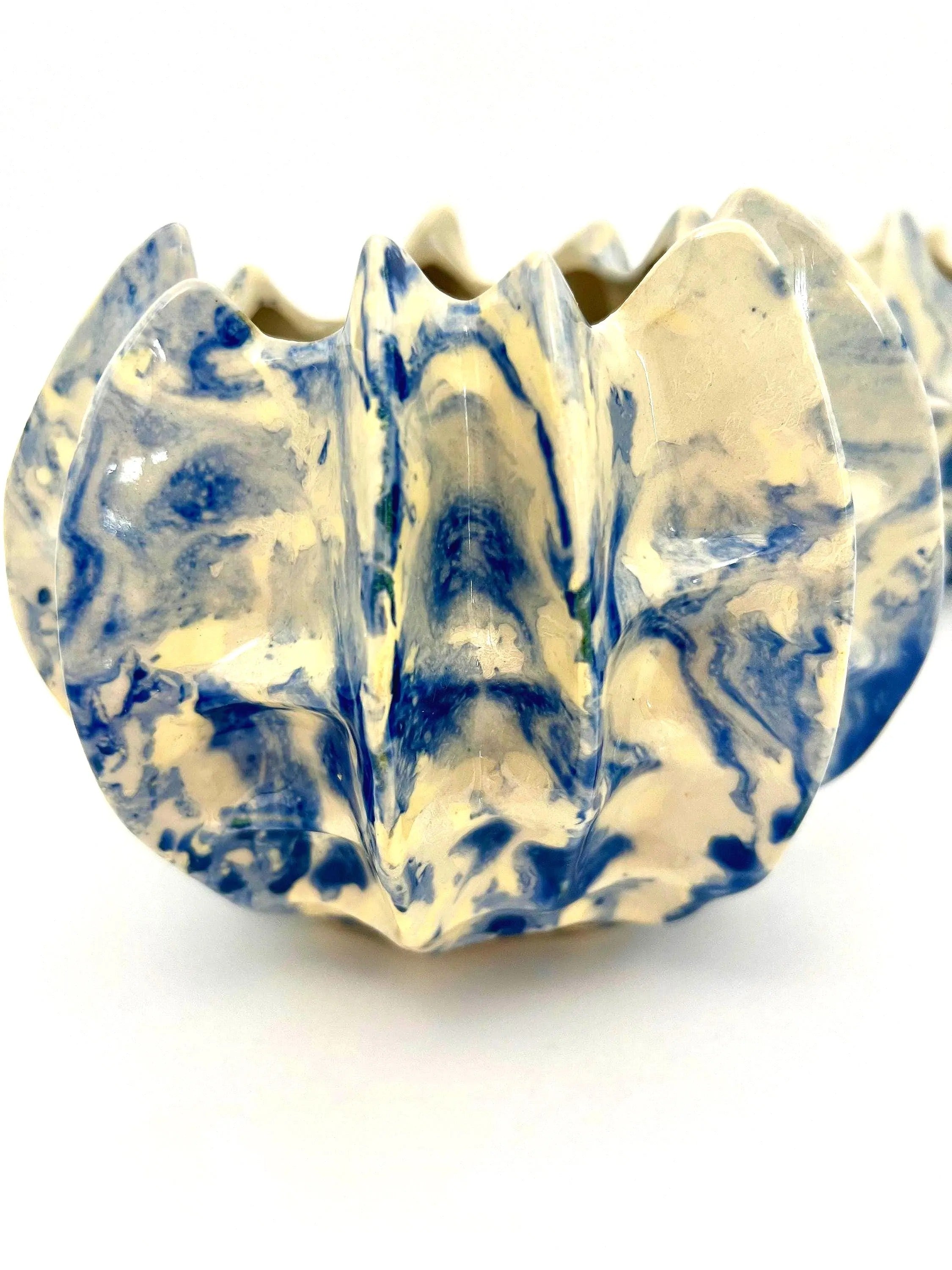 Pair of vintage ceramic planters or candle holders with an abstract blue and white splatter-ware pattern.