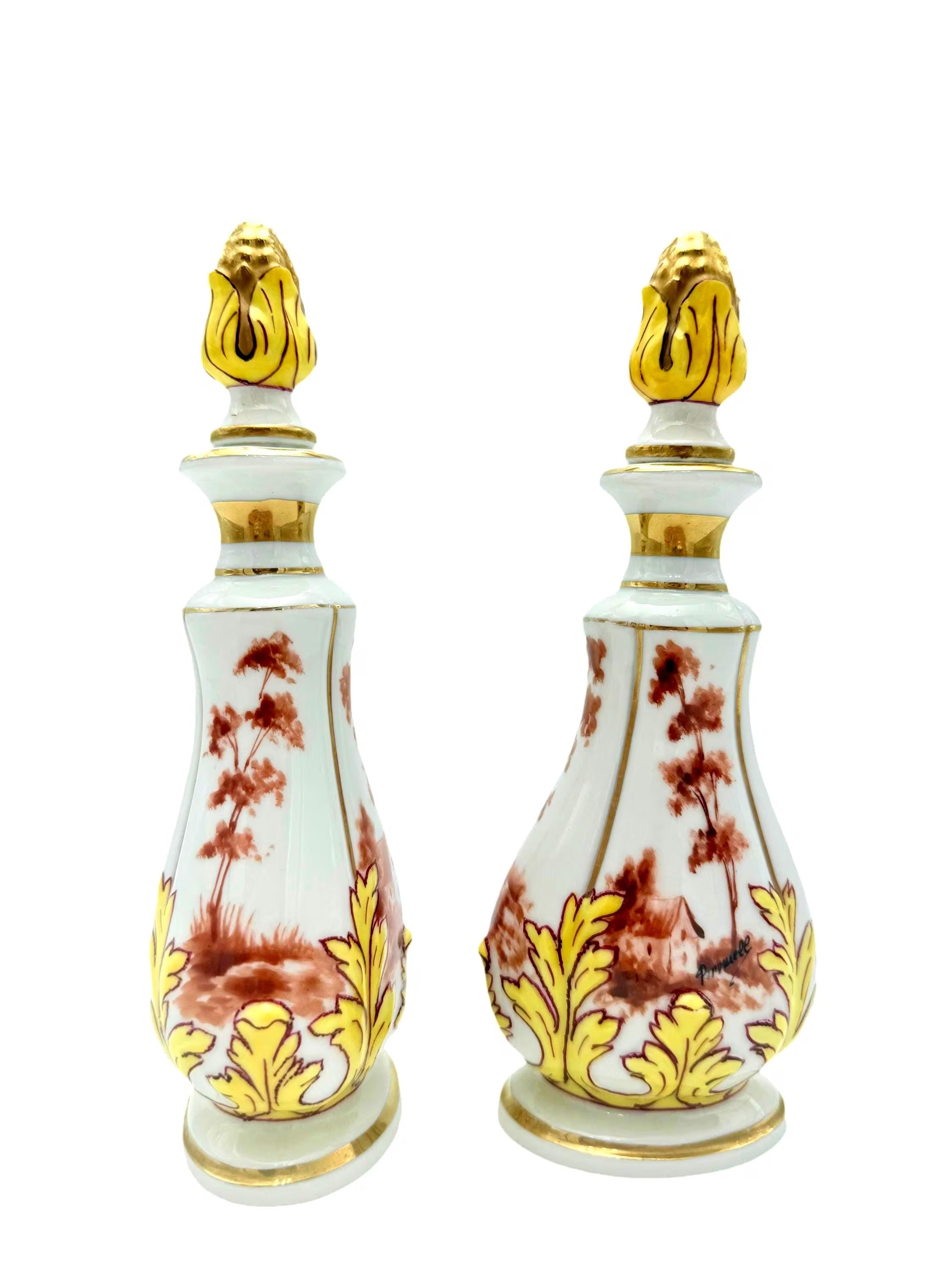 Pair of 19th-century French porcelain cologne bottles with intricate hand-painted Victorian scenes.