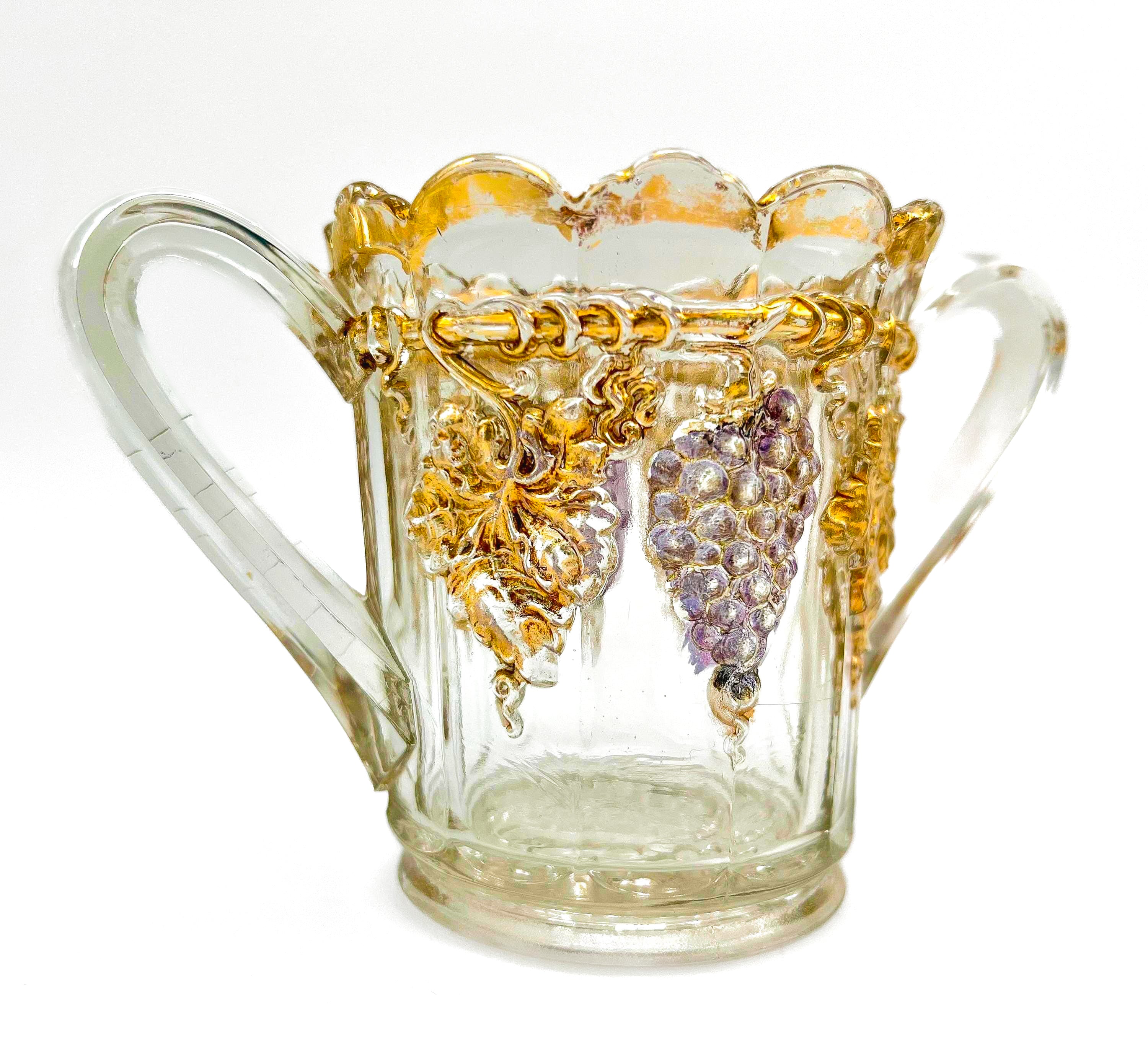 Antique Early American Pattern Glass (EAPG) brunch set featuring a detailed grape and leaf relief.