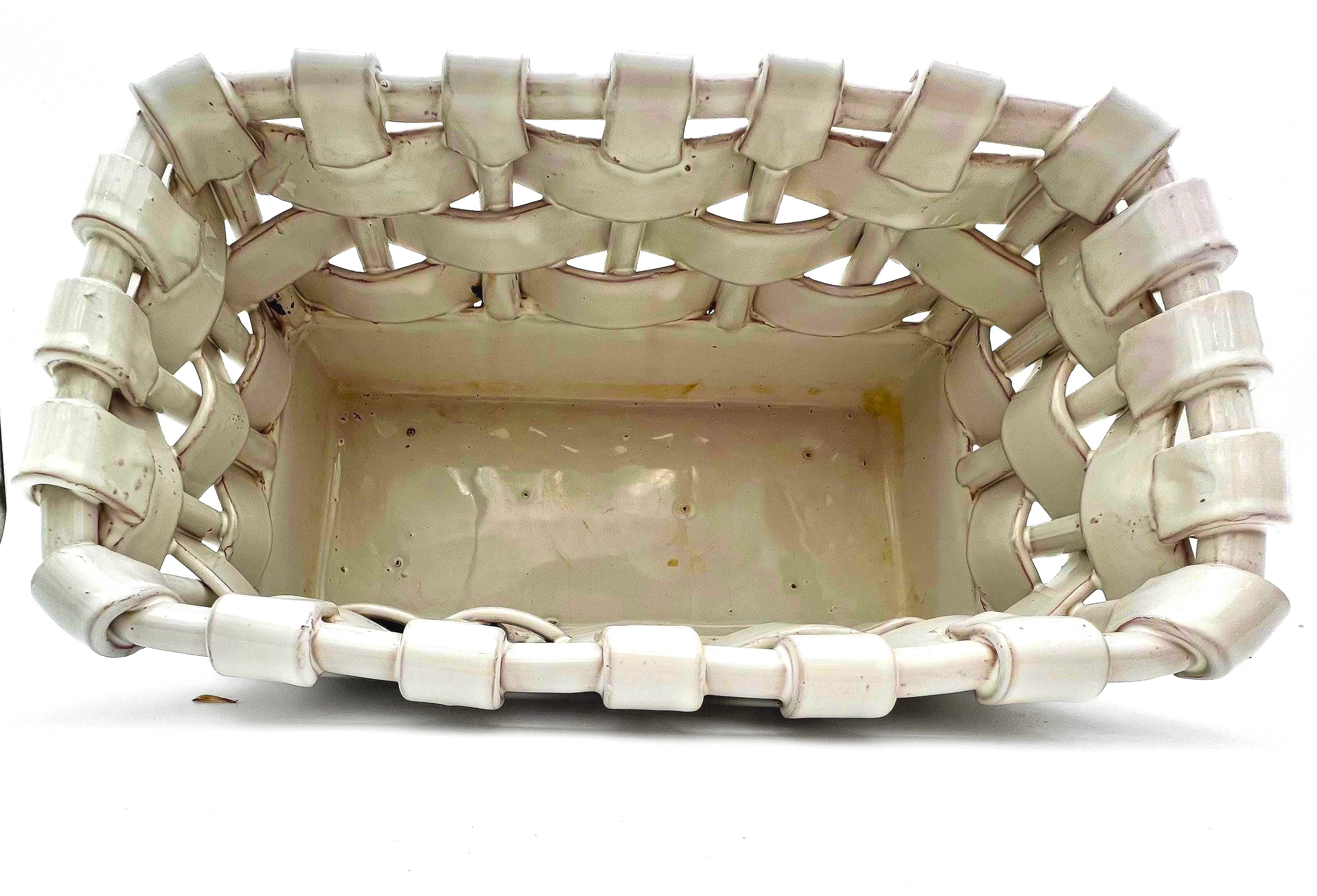 Italian glazed terra cotta decorative basket with a realistic ceramic woven texture.