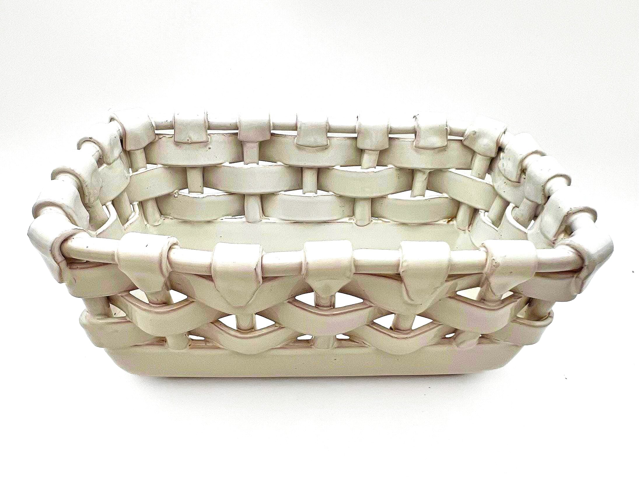 Italian glazed terra cotta decorative basket with a realistic ceramic woven texture.