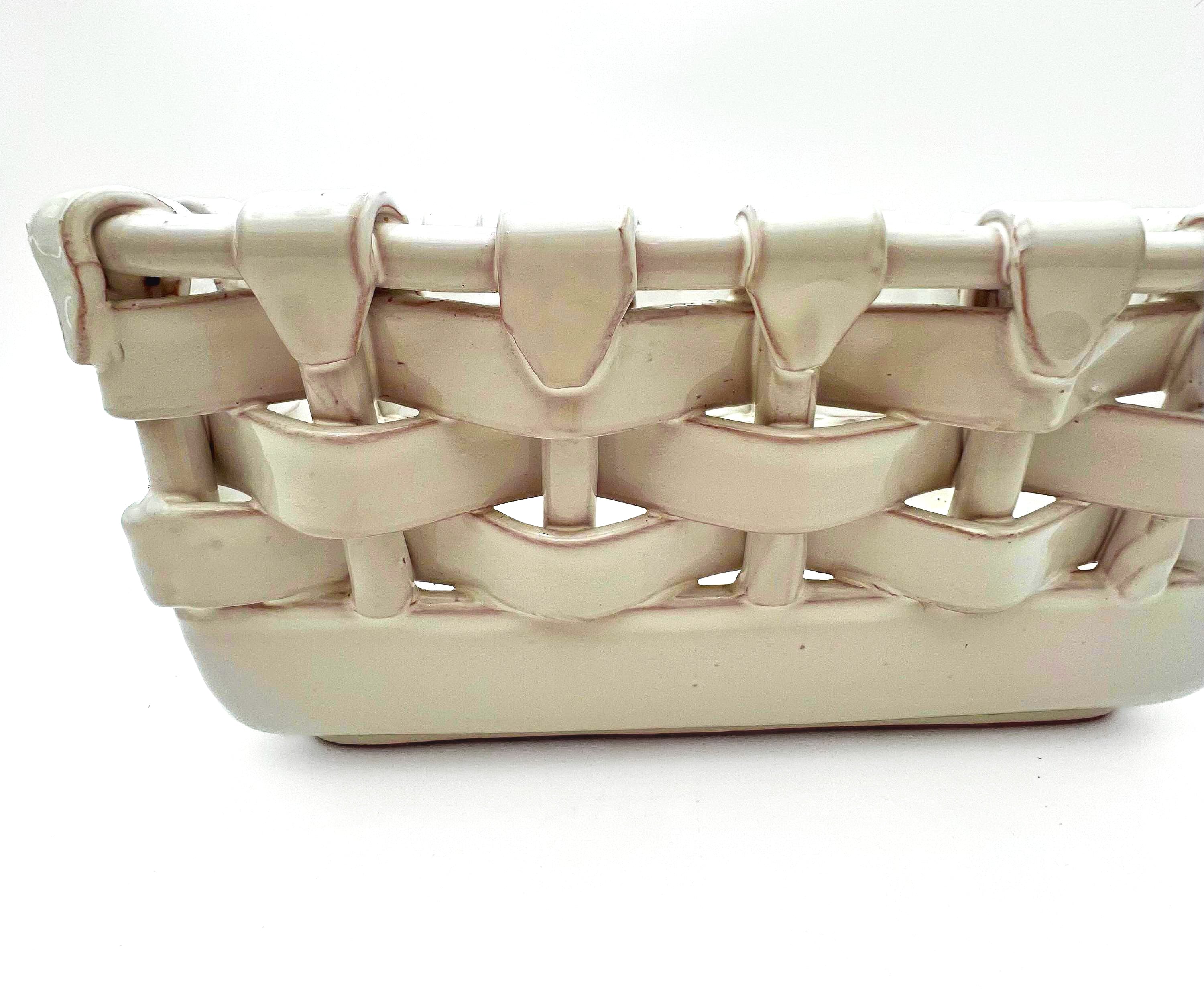 Italian glazed terra cotta decorative basket with a realistic ceramic woven texture.