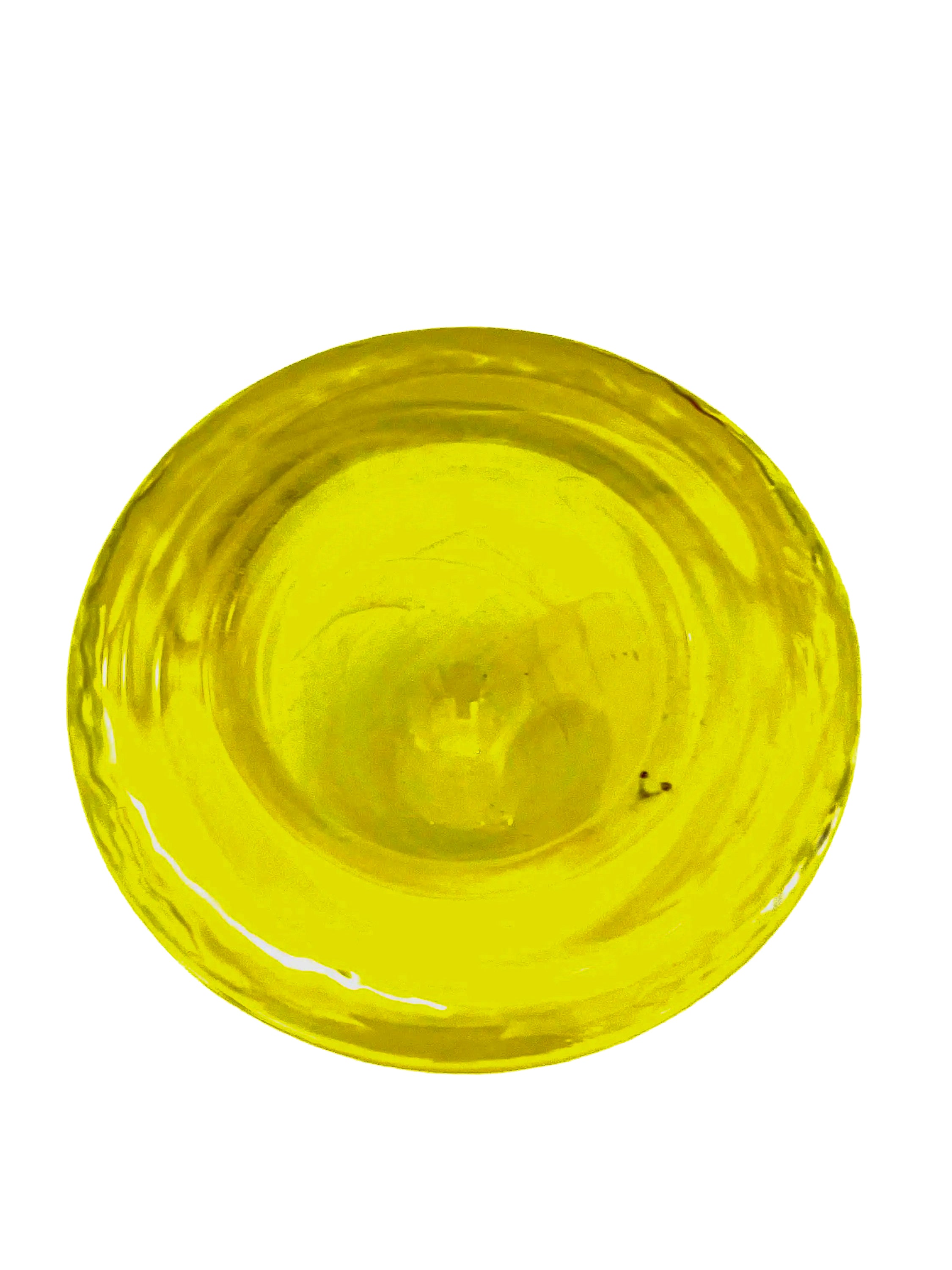 Vintage mouth-blown Kosta Boda glass tea light holder in a vibrant yellow glass.