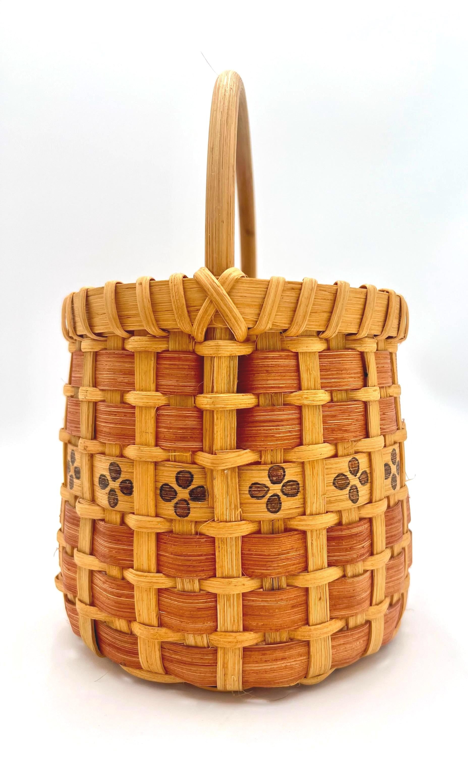 One-of-a-kind vintage artist-signed basket featuring intricate handmade weaving and natural materials.
