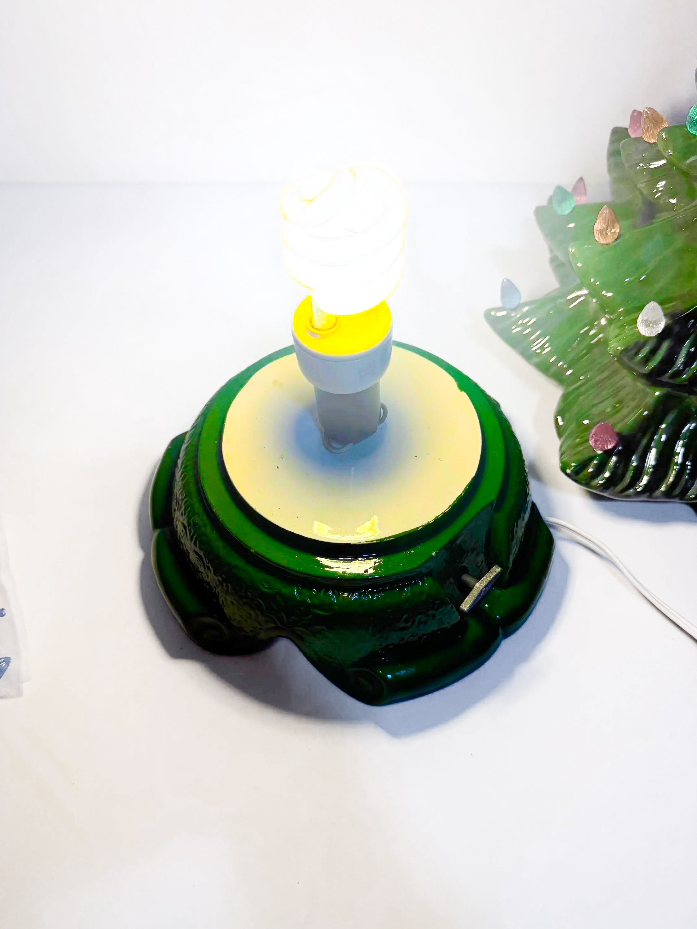 Large lighted 22-inch ceramic Christmas tree by Atlantic Mold with multicolor bulbs, star topper, and music box.
