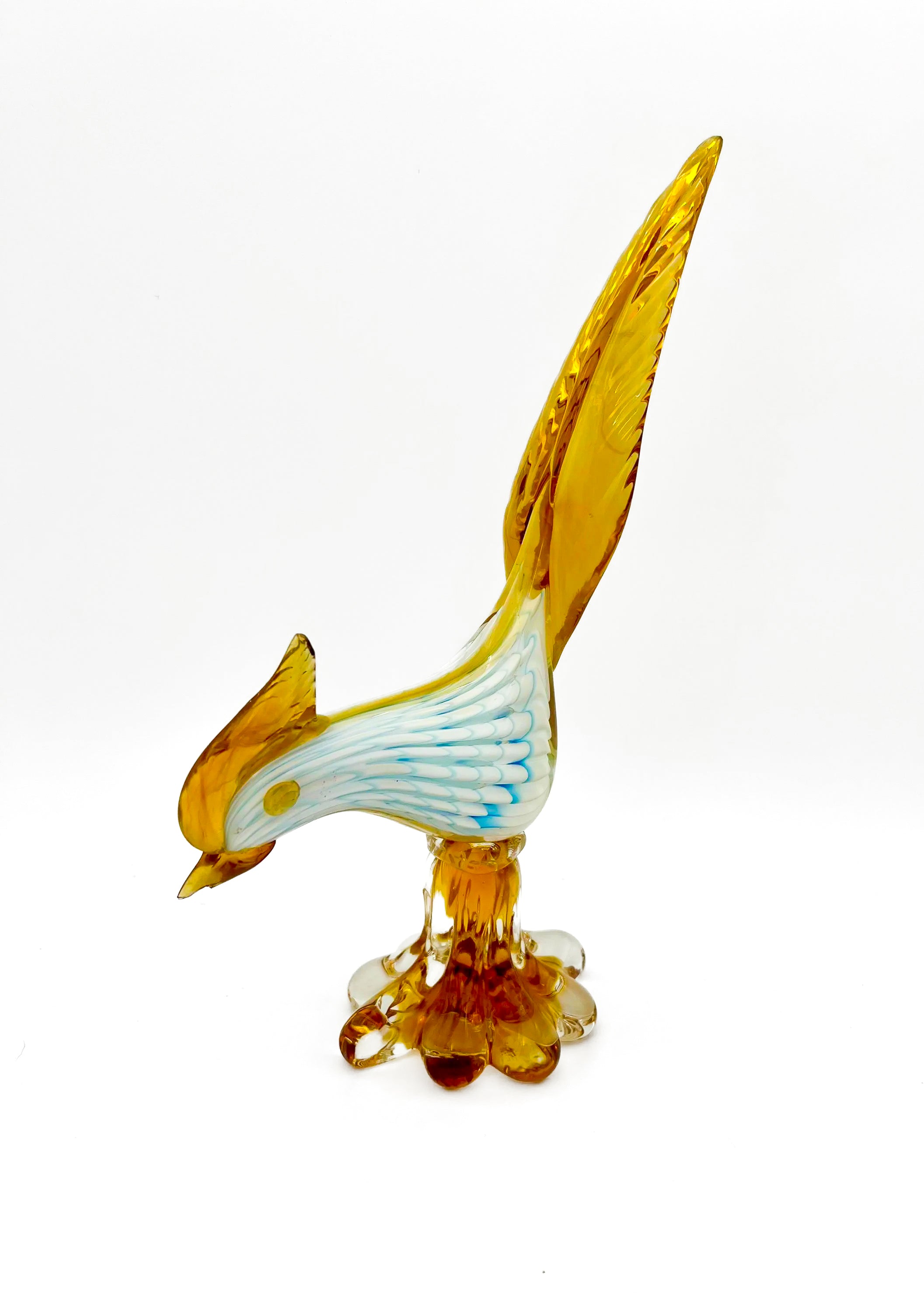 Small decorative vintage figurine of a bird made from delicately hand-blown clear glass.