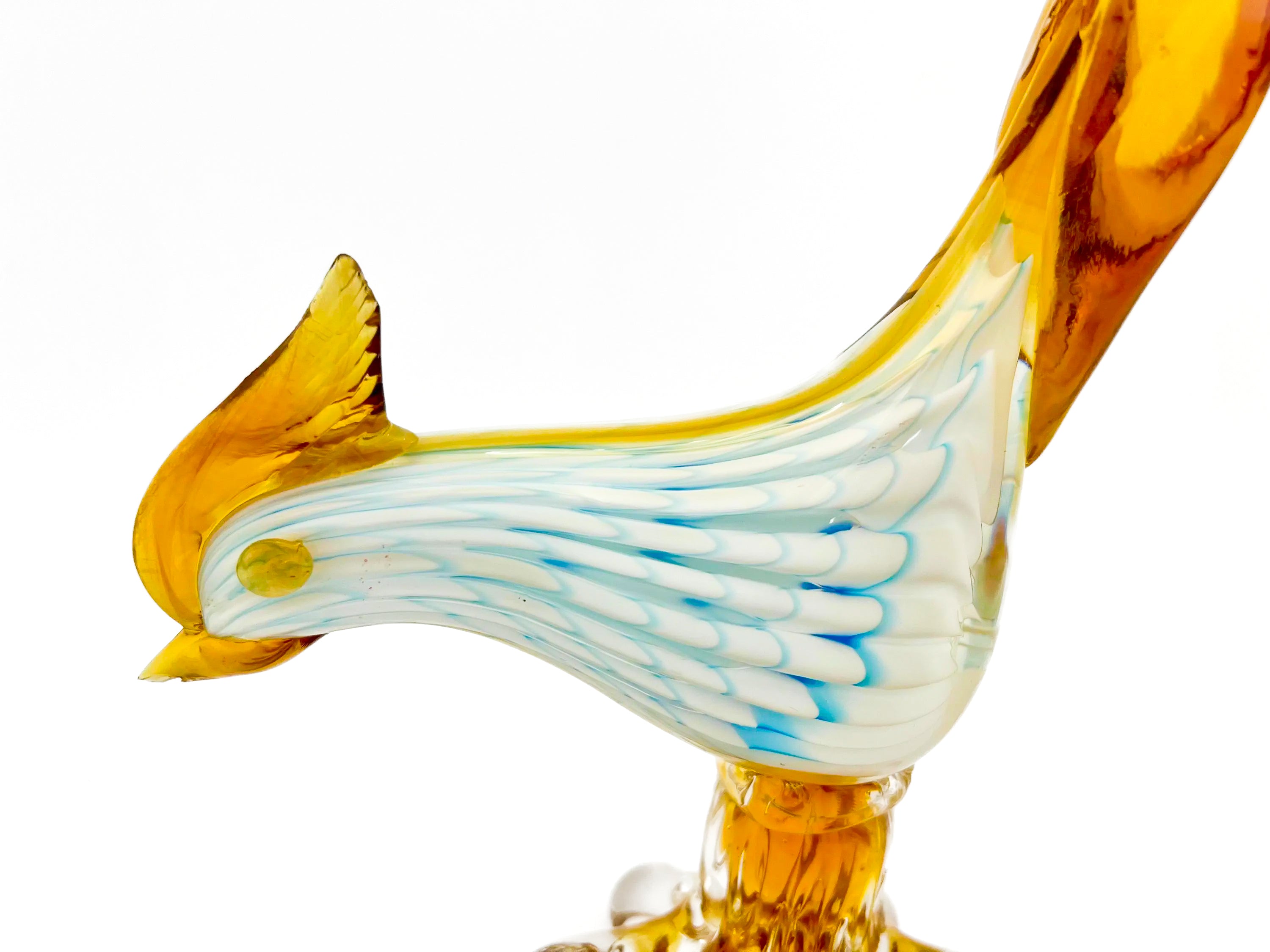 Small decorative vintage figurine of a bird made from delicately hand-blown clear glass.