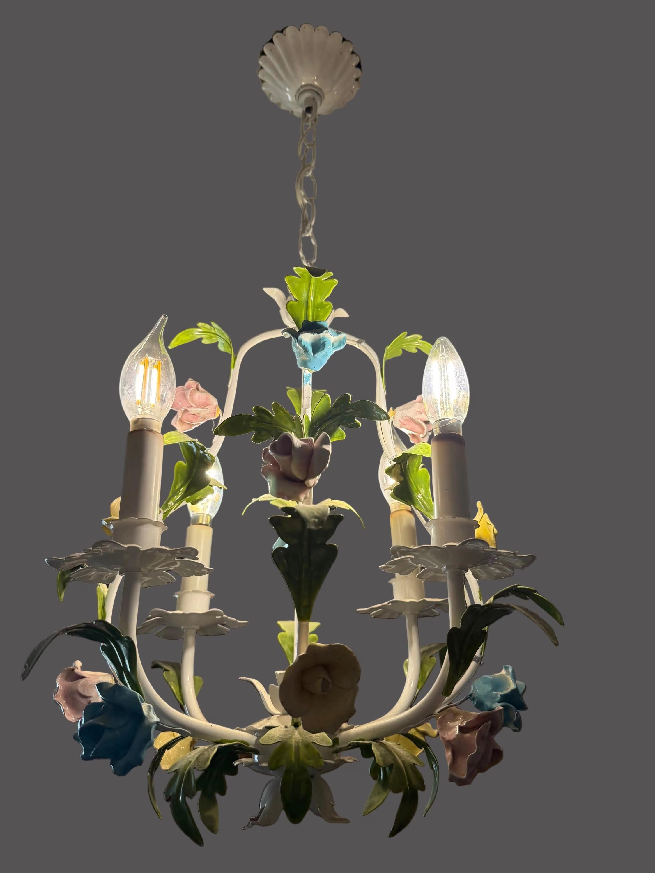 Hand-painted Italian tole chandelier featuring a European garden floral design in pastel colors.