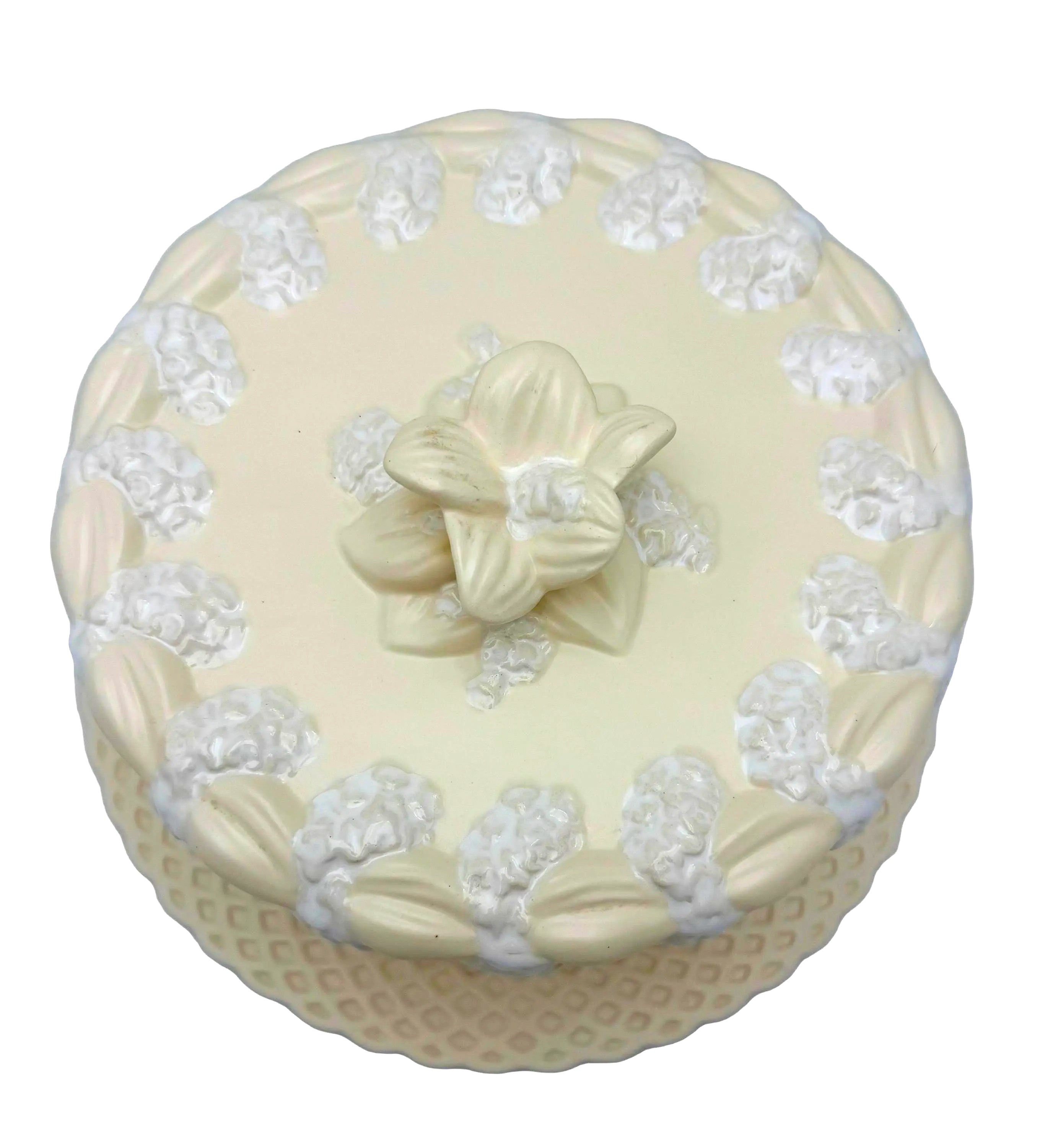 Large Portuguese earthenware dome and matching plate with a cream-white floral relief design.