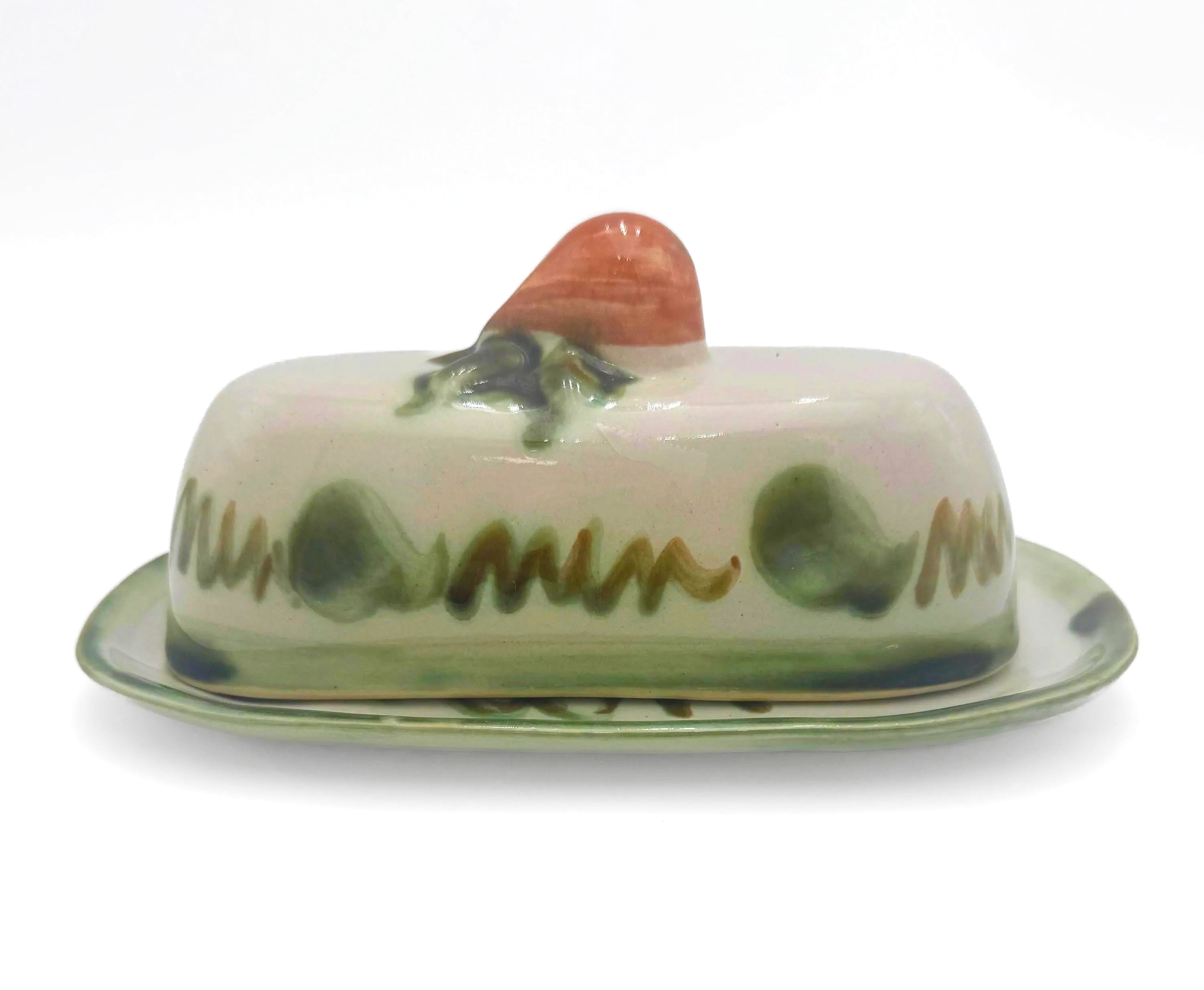 Vintage 1950s John B. Taylor Harvest pattern ceramic covered butter dish with raised fruit motifs.