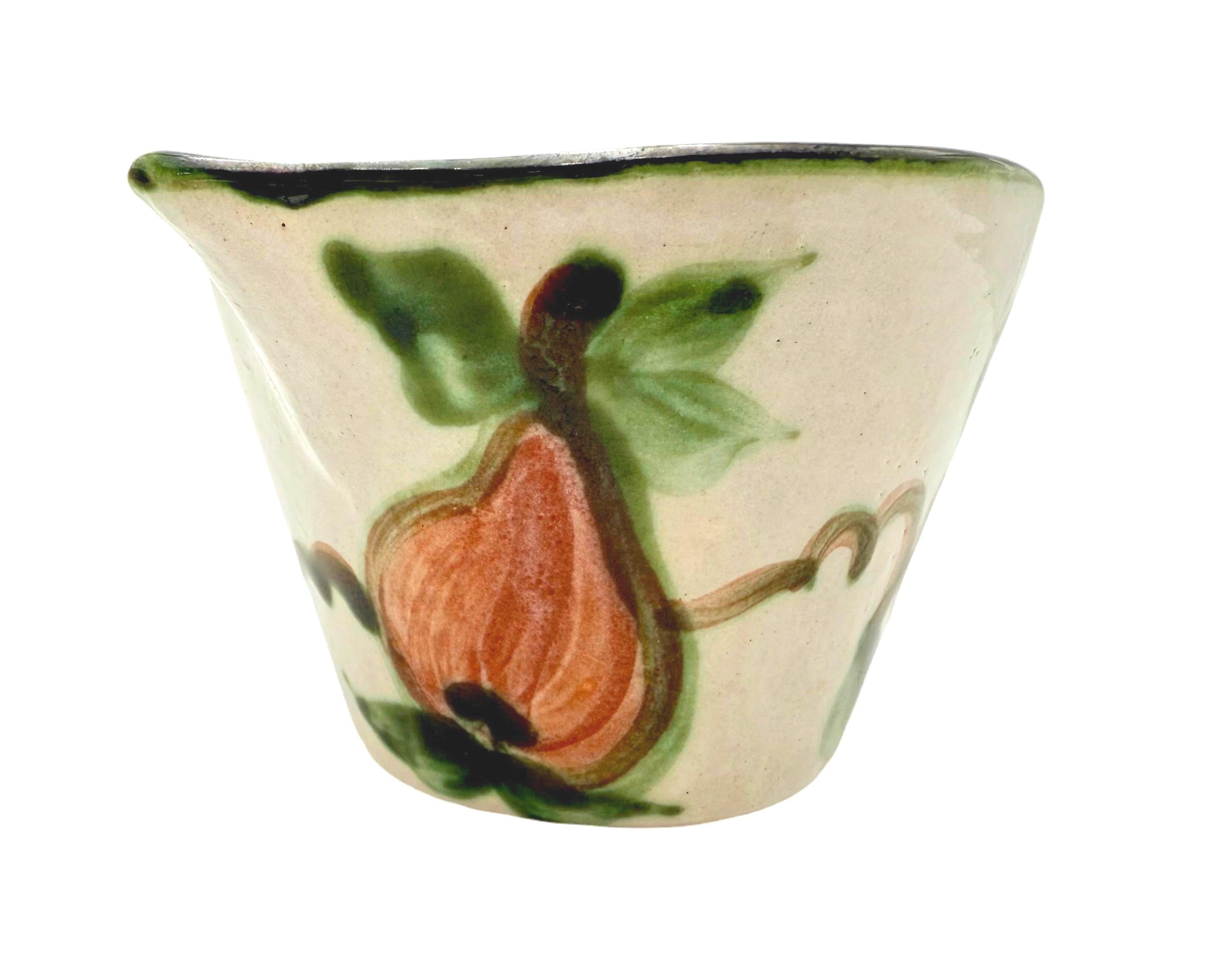 Vintage 1950s John B. Taylor Harvest pattern ceramic creamer with raised fruit and leaf motif.