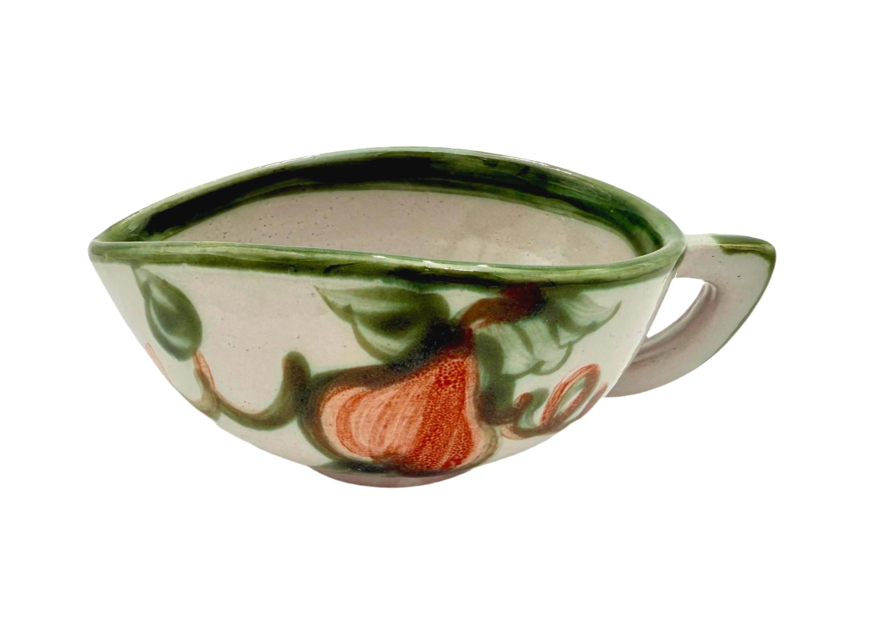 Vintage 1950s John B. Taylor Harvest pattern ceramic gravy boat in a rustic mid-century glaze.