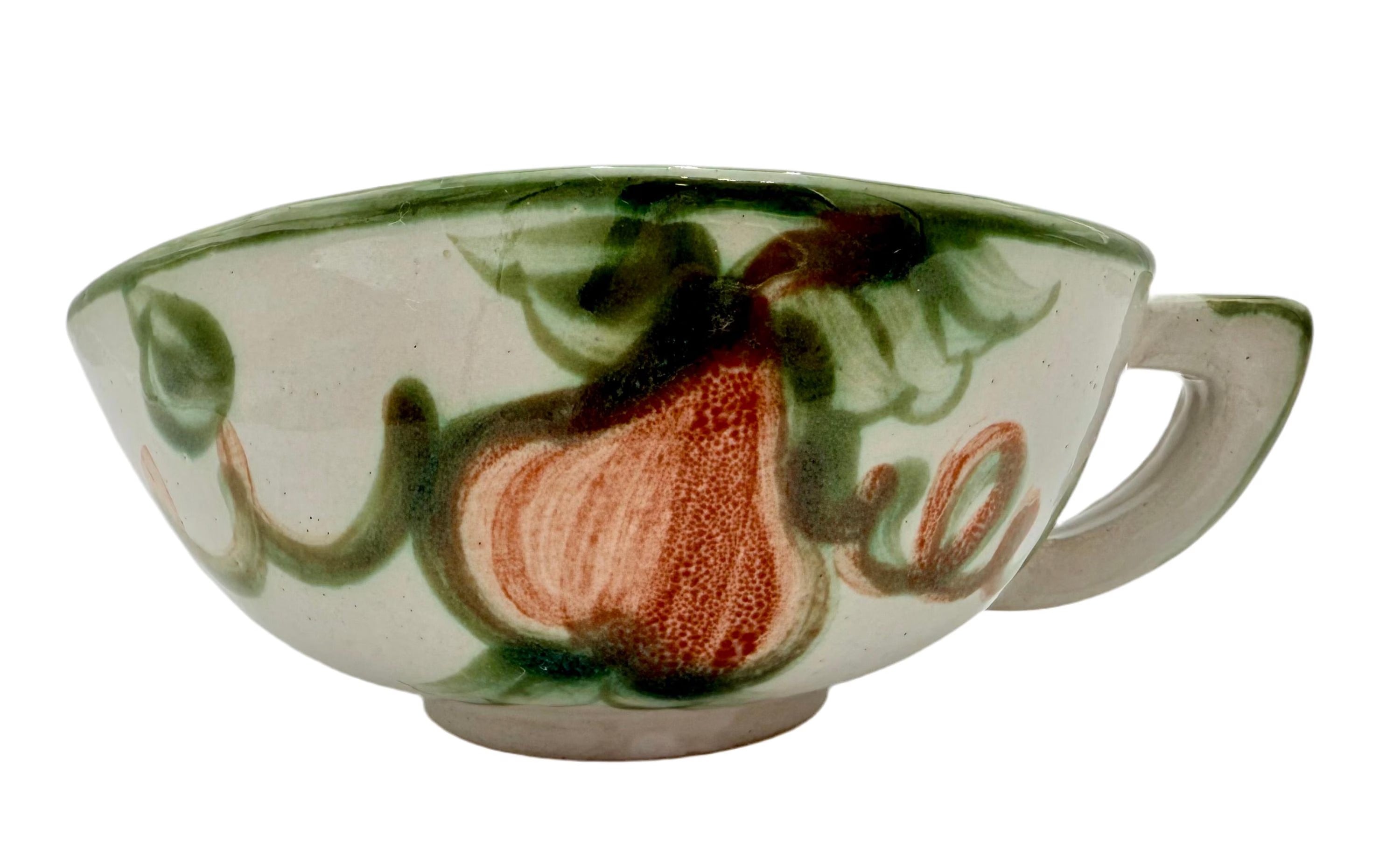 Vintage 1950s John B. Taylor Harvest pattern ceramic gravy boat in a rustic mid-century glaze.