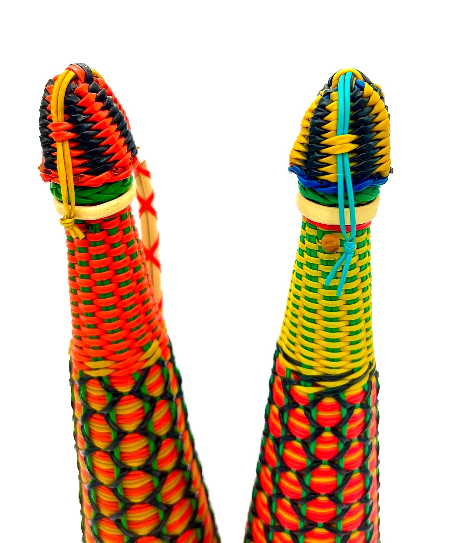 Spanish vintage decanter wrapped in colorful 1960s boho Scoubidou woven plastic webbing.