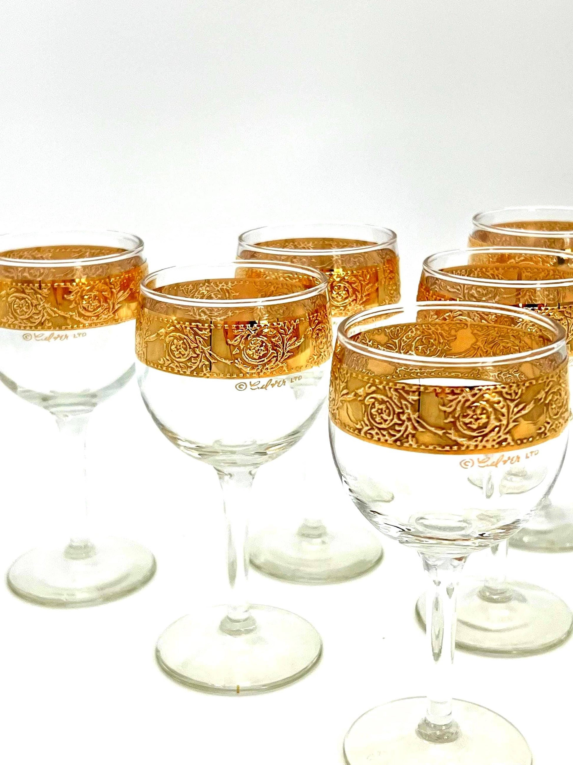 Set of 6 vintage Culver Tyrol wine glasses featuring 22k gold encrusted textured bands on clear glass stems.
