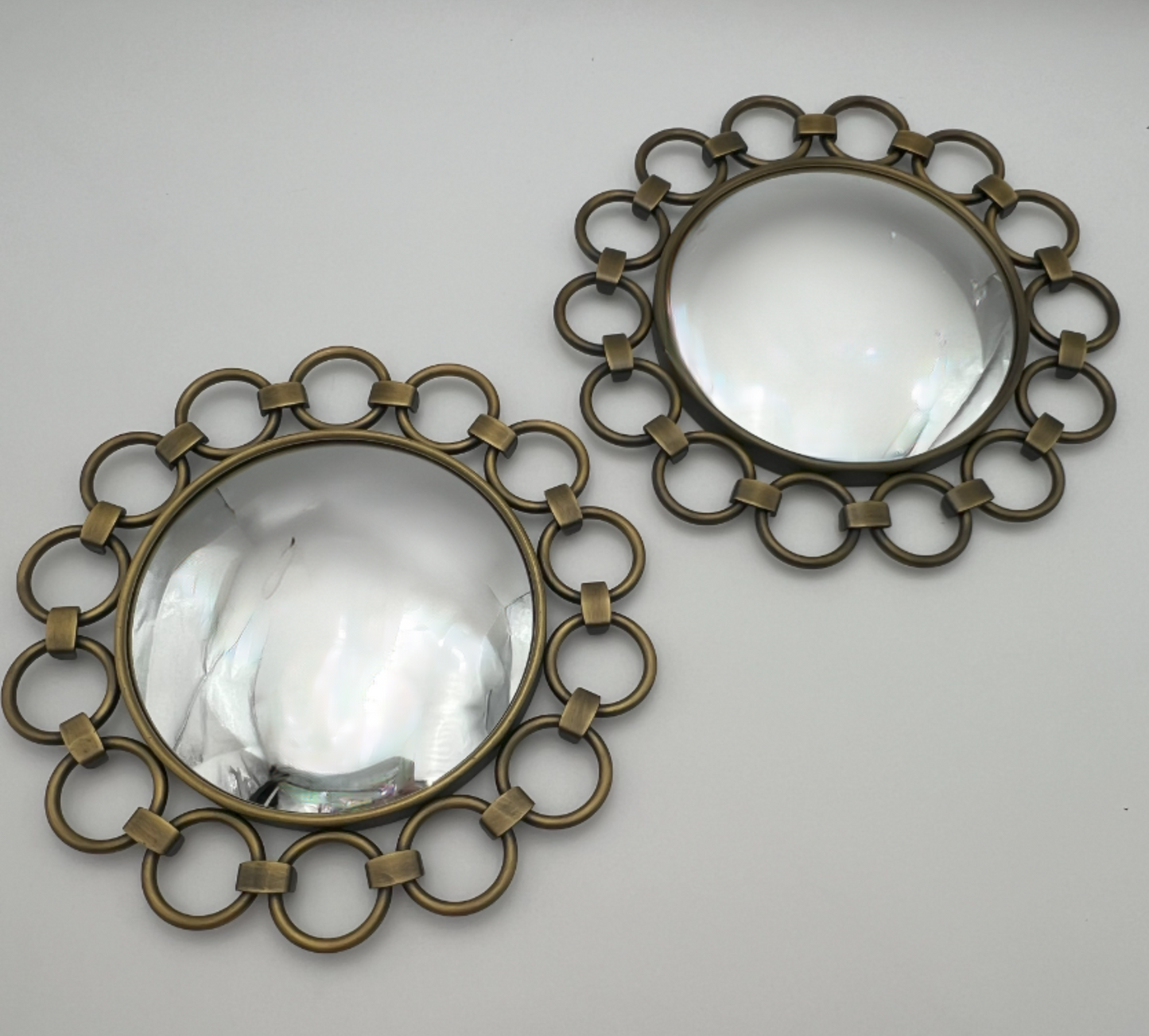 VINTAGE PAIR OF VICTORIA HAGAN CIRCULAR BRASS MIRRORS