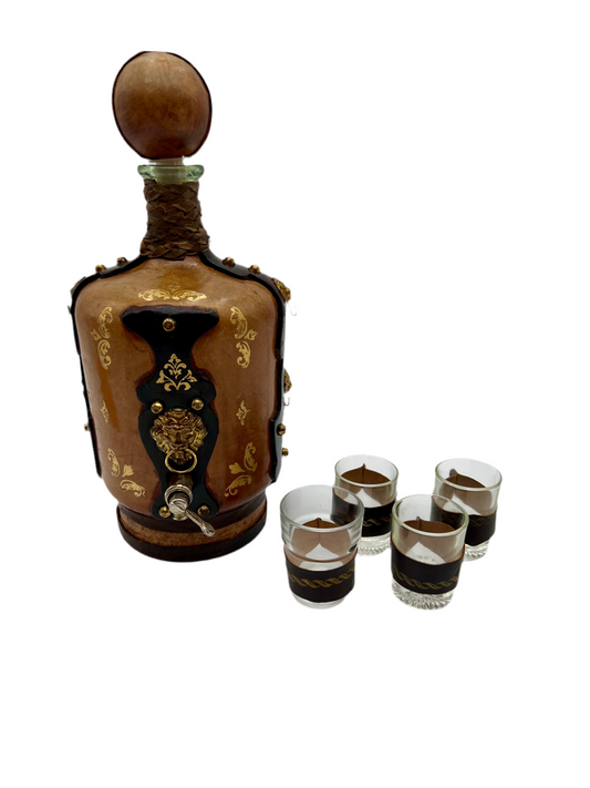 VINTAGE LEATHER WRAPPED WHISKY JUG WITH BRASS TAP AND4 LEATHER WRAPPED SHOT GLASSES