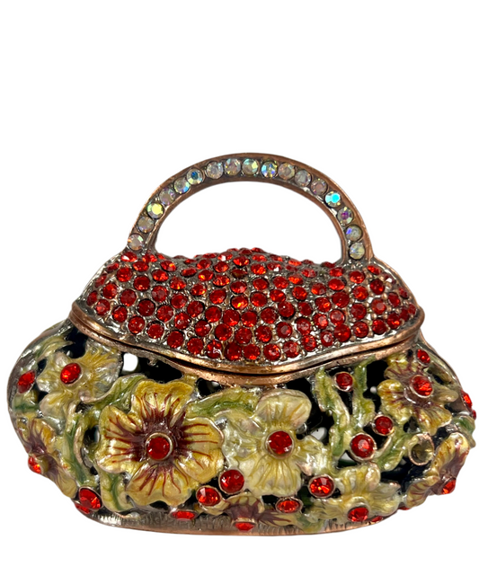 VINTAGE SMALL TRINKET/JEWELRY BOX PURSE SHAPED WITH CUT OUT FLOWERS AND RED CRYSTALS